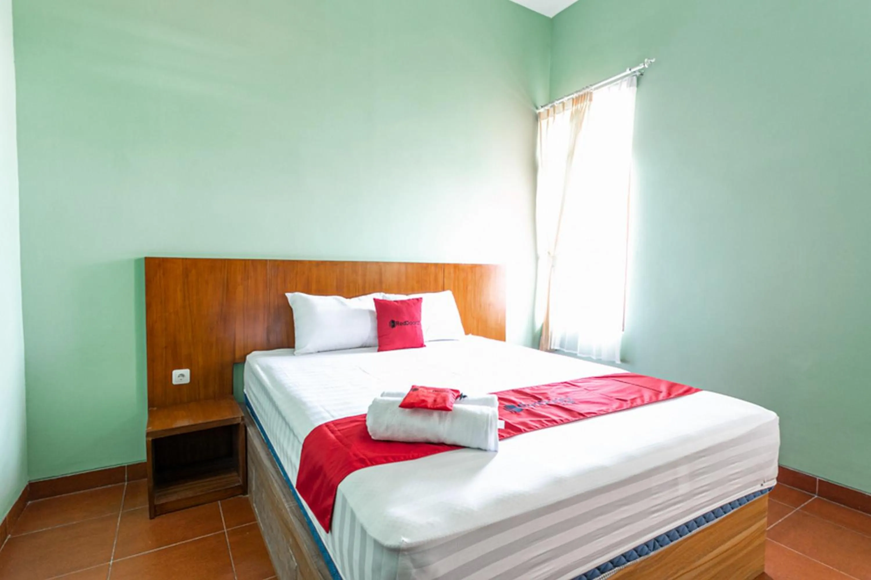 Bed in RedDoorz near Puro Mangkunegaran