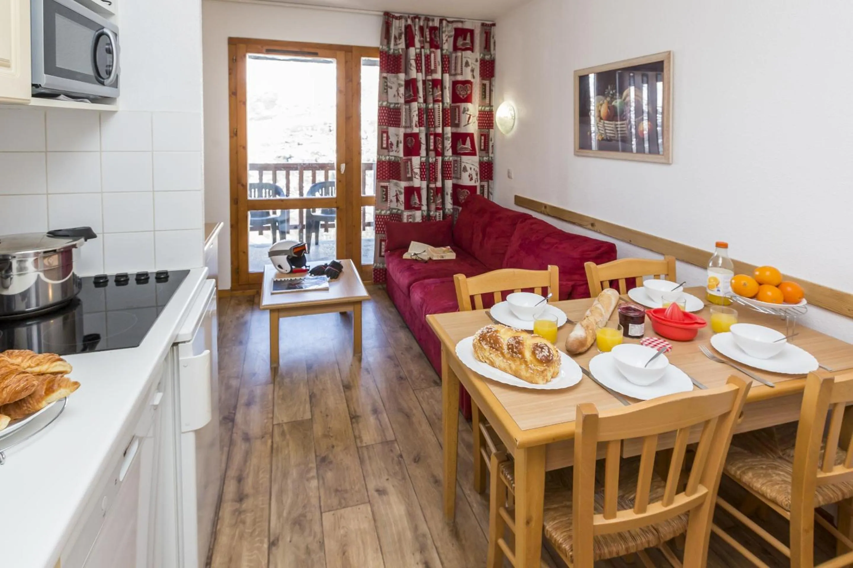 Kitchen or kitchenette in Résidence Odalys Les Lumières de Neige