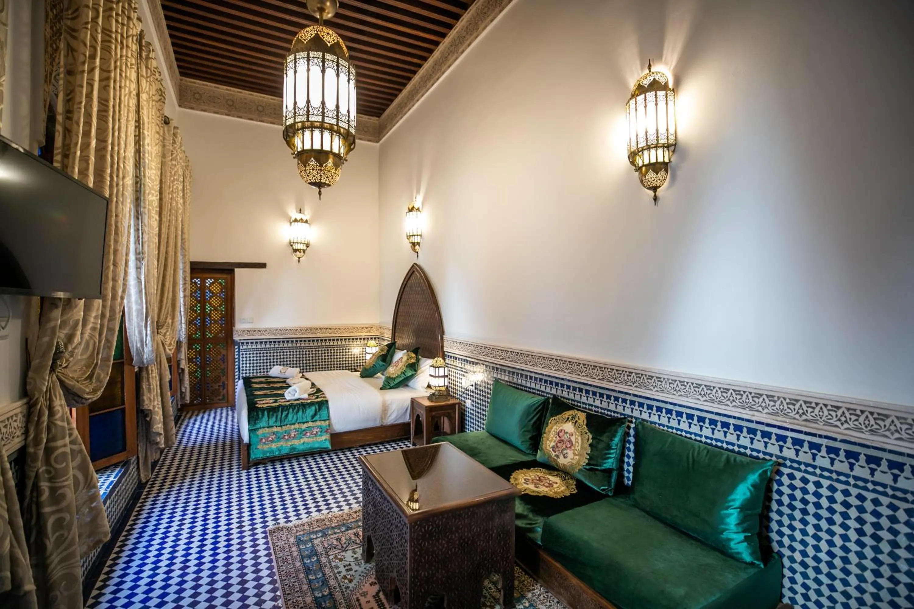 Seating area, Bed in Riad Sidrat Fes