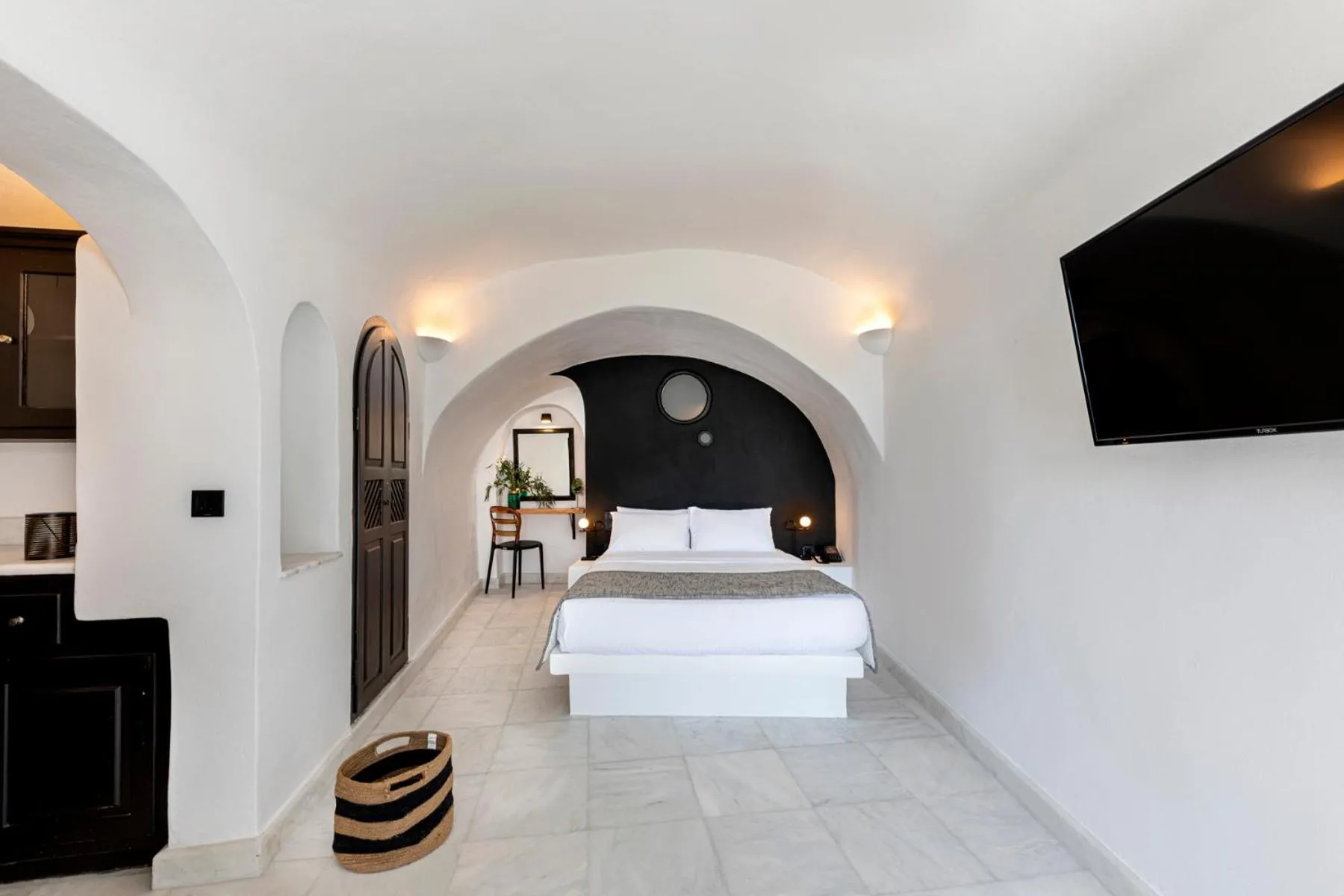 Photo of the whole room, Bed in Pearl of Caldera Oia - Boutique Hotel by Pearl Hotel Collection