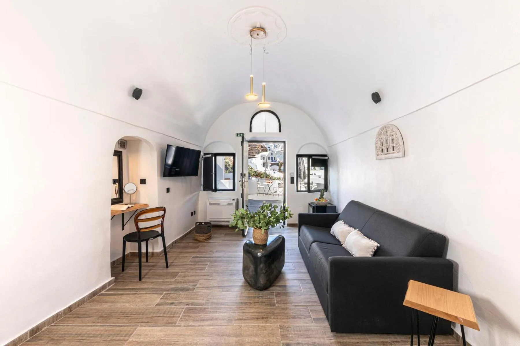 Photo of the whole room in Pearl of Caldera Oia - Boutique Hotel by Pearl Hotel Collection