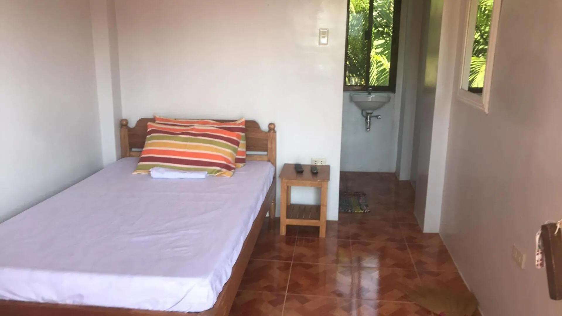 Bed in Lotus Sun & Waves Beach Resort