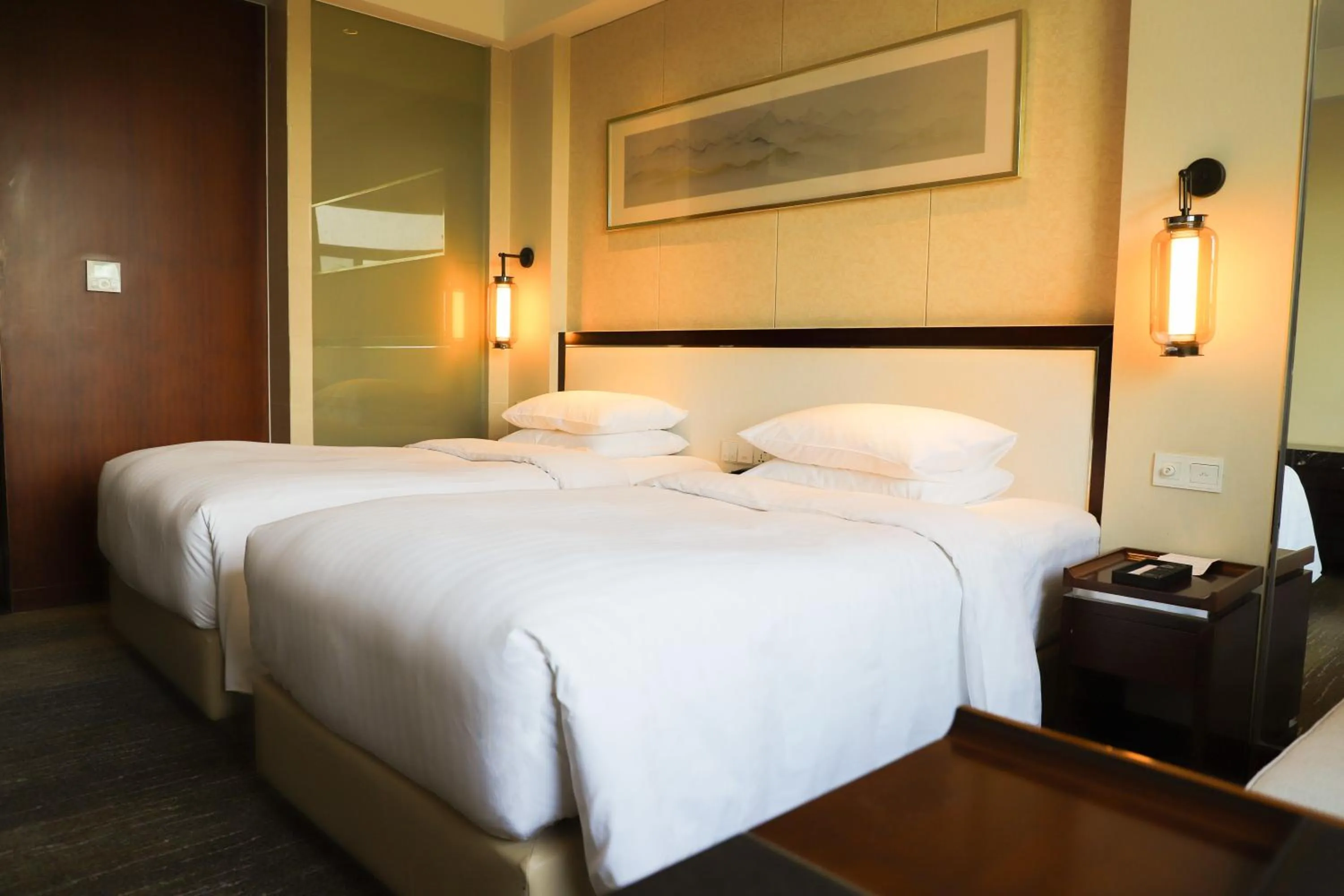Bed in Courtyard by Marriott Wuxi Lihu Lake