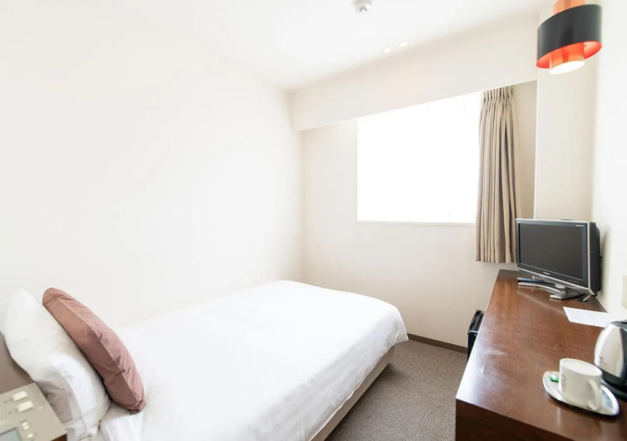 Photo of the whole room, Bed in Hotel day by day