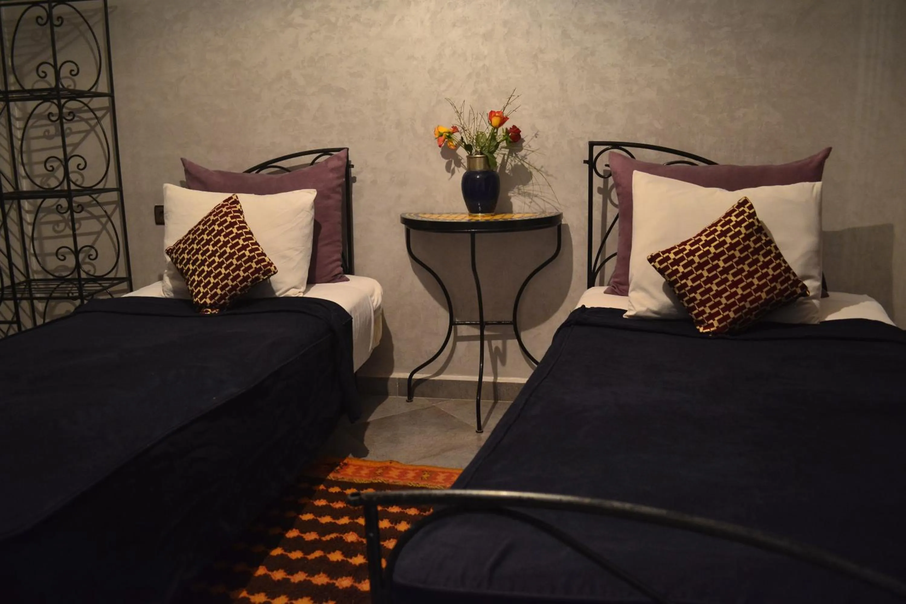 Bed in Riad Hôtel Belleville Marrakech