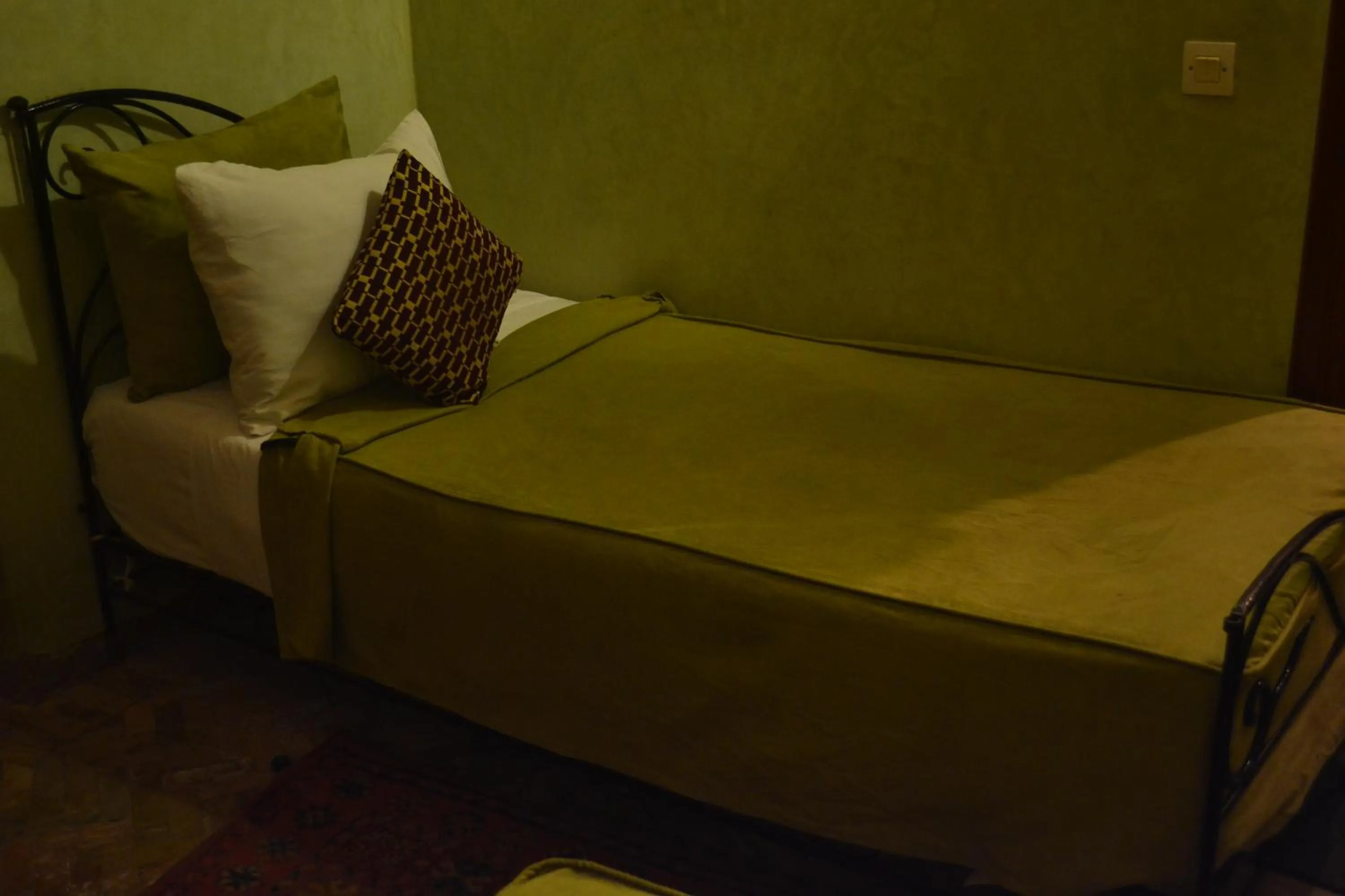 Bed in Riad Hôtel Belleville Marrakech