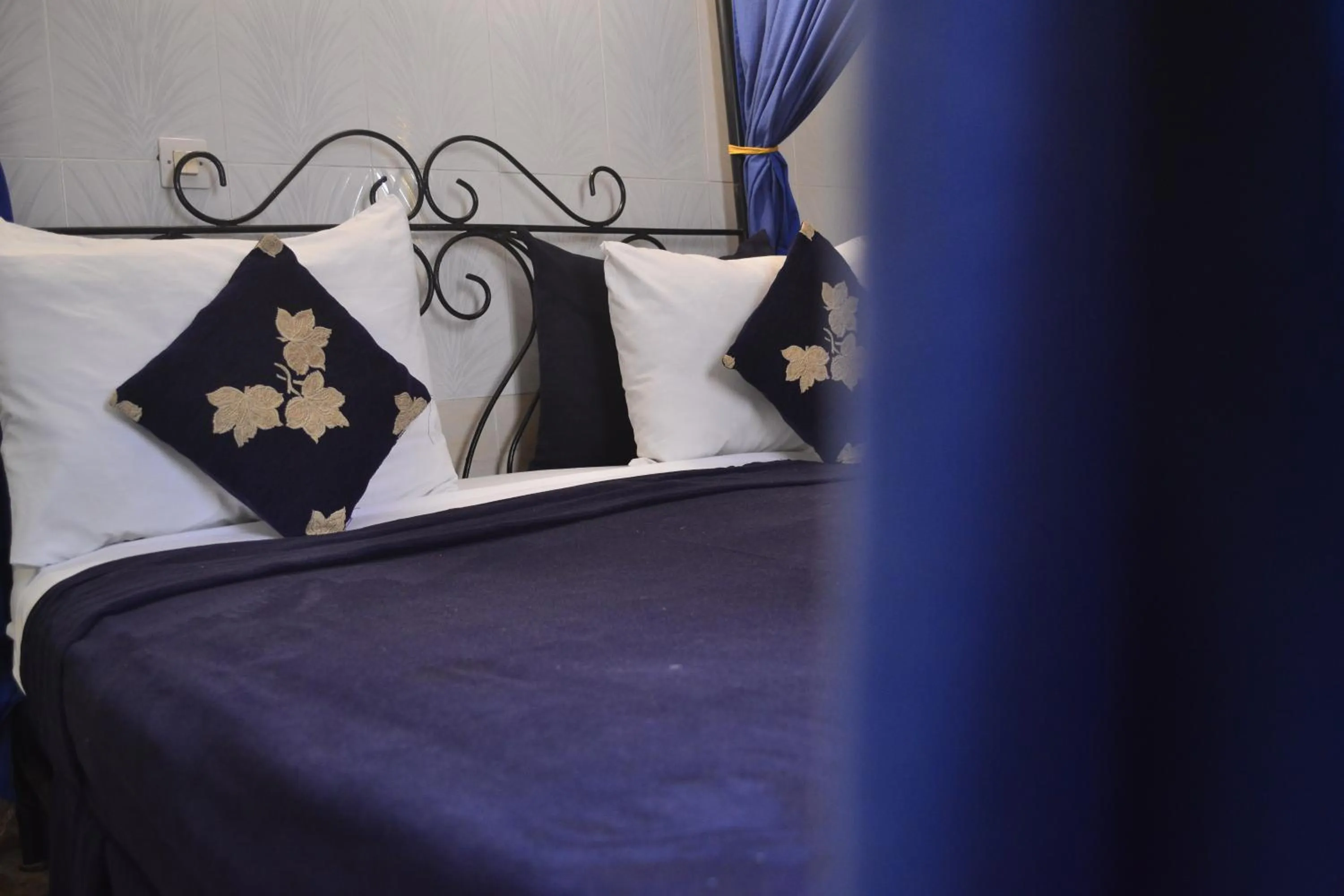 Decorative detail, Bed in Riad Hôtel Belleville Marrakech