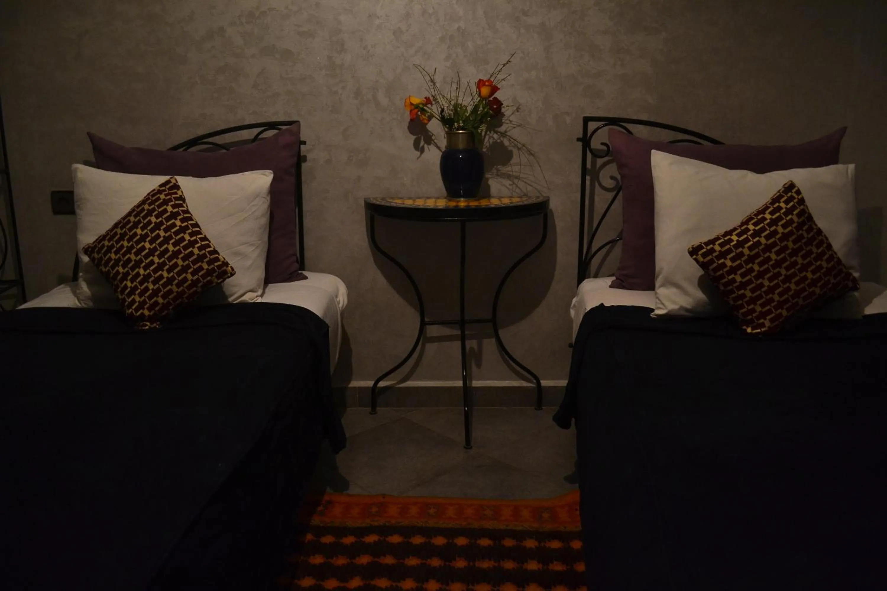 Bed in Riad Hôtel Belleville Marrakech