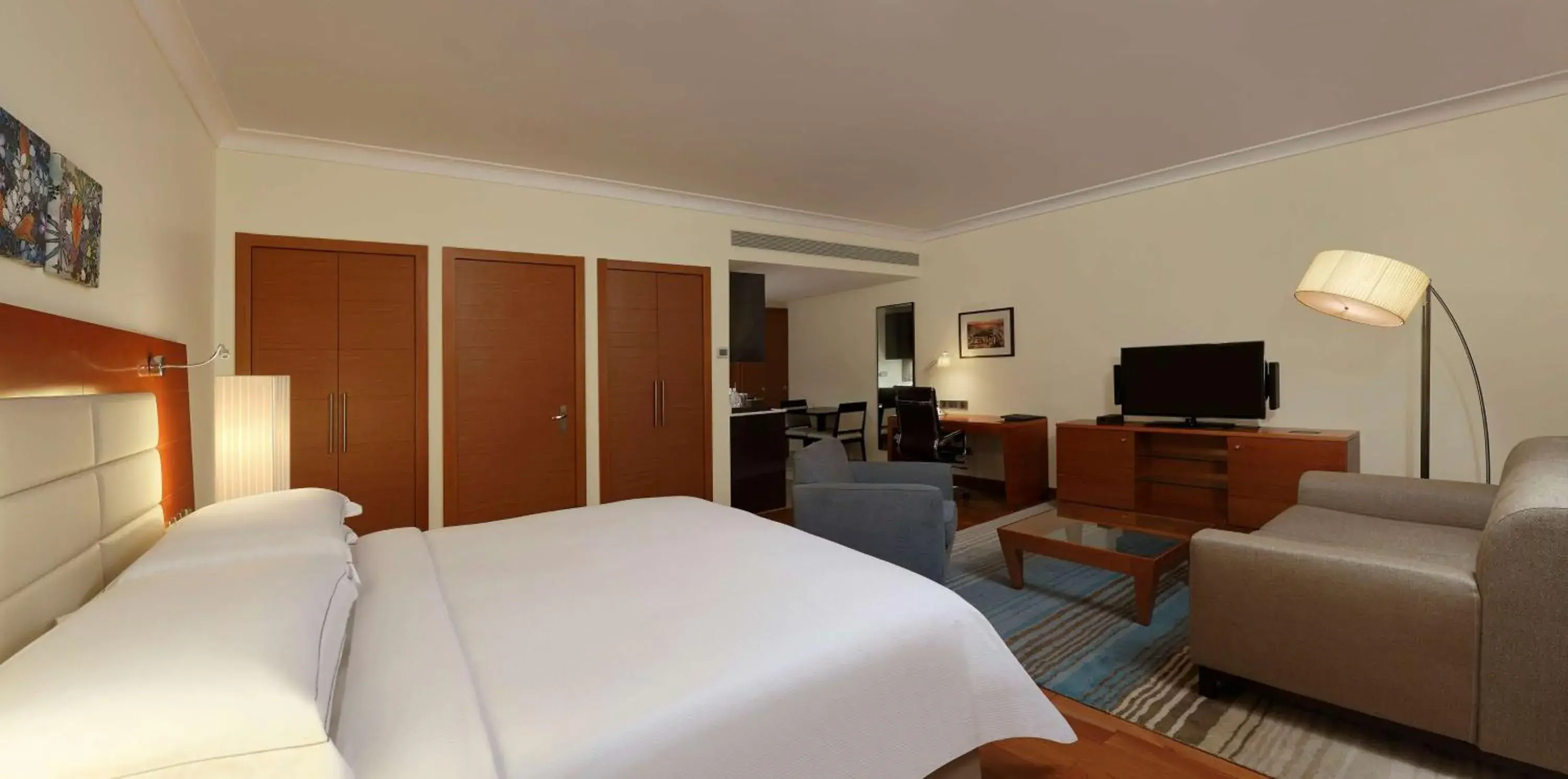 Deluxe King Room with Kitchenette in Hilton Bangalore Embassy GolfLinks Deluxe King Room with Kitchenette in Hilton Bangalore Embassy GolfLinks