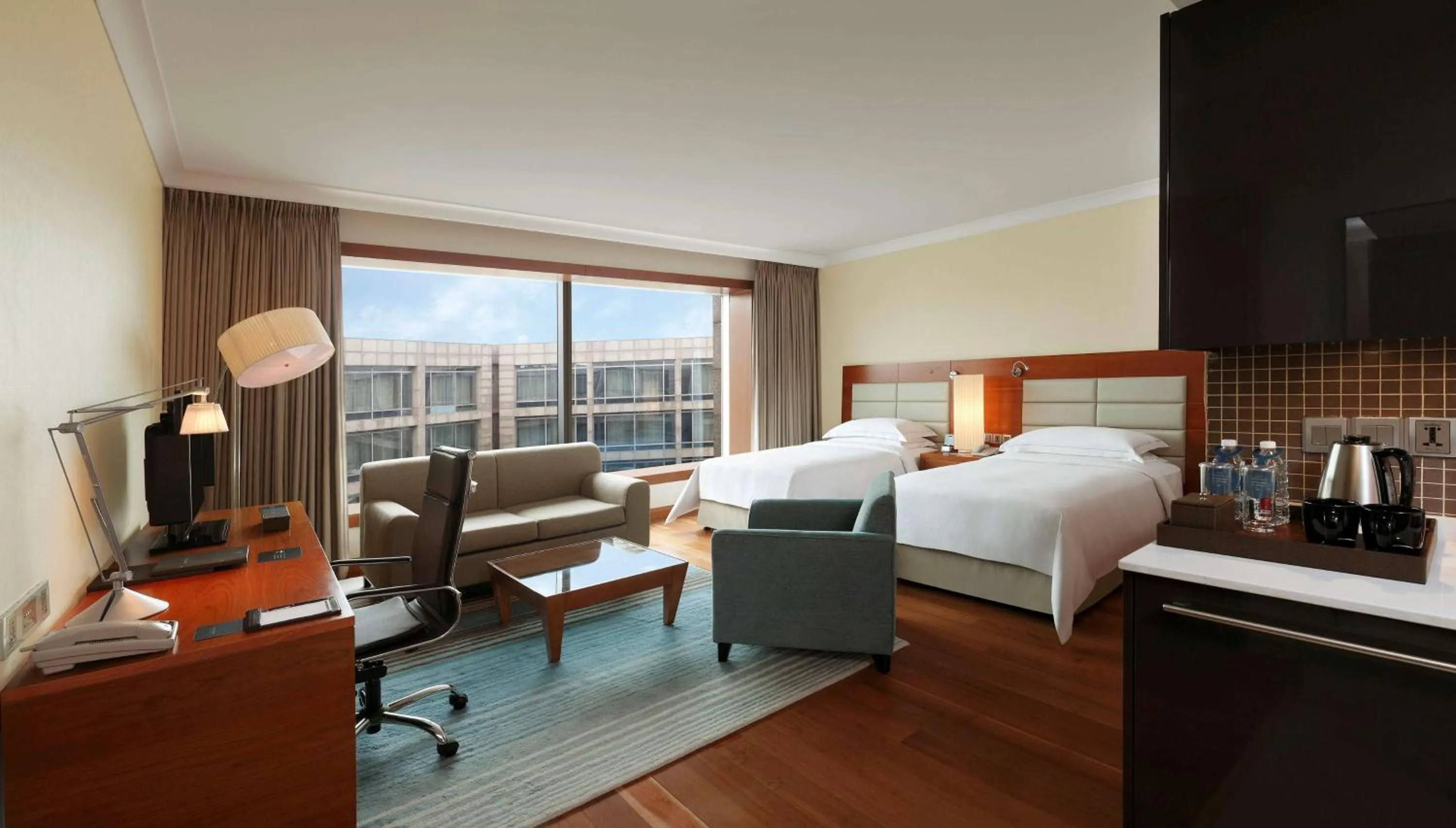 View (from property/room), Bed in Hilton Bangalore Embassy GolfLinks