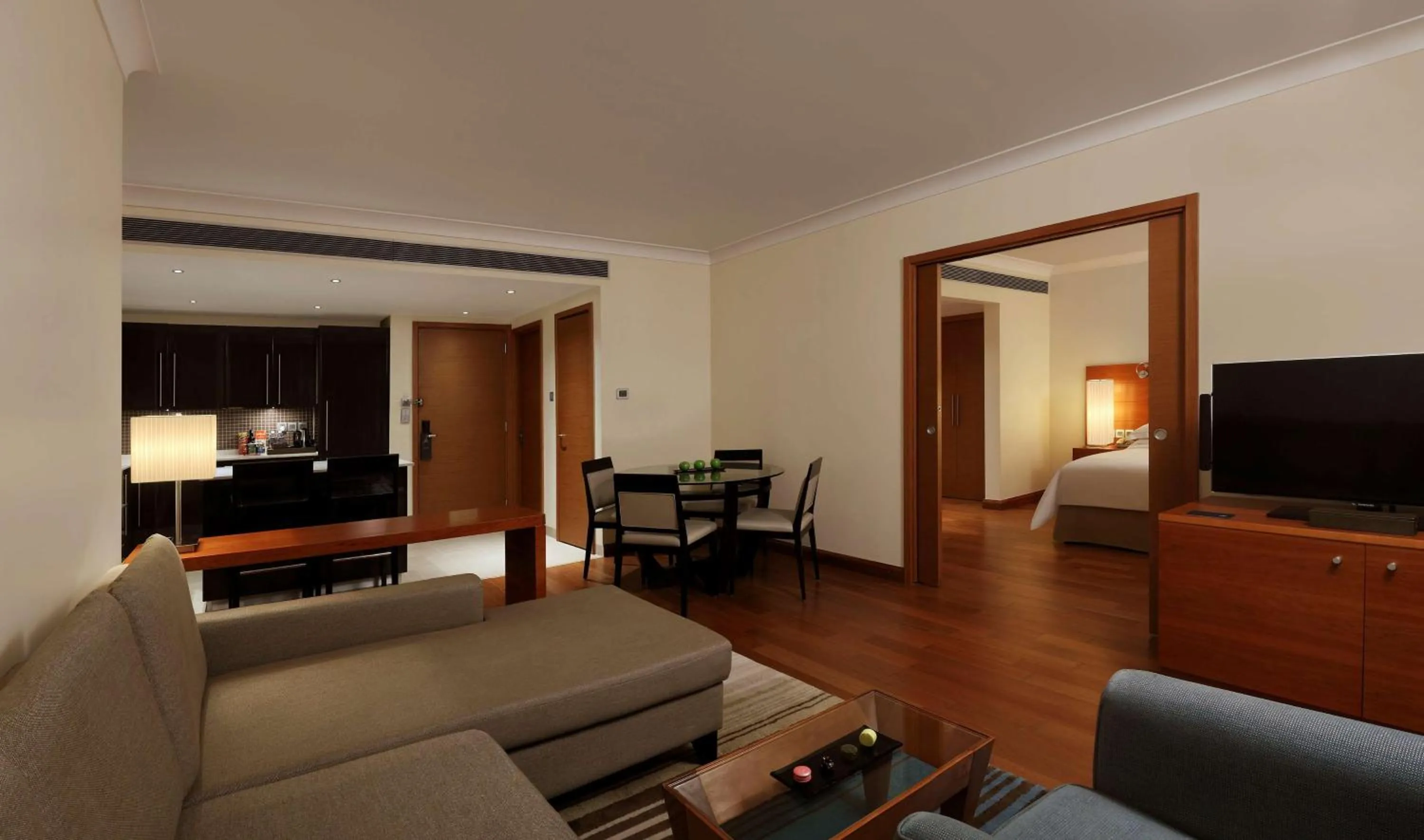 Living room, Bed in Hilton Bangalore Embassy GolfLinks