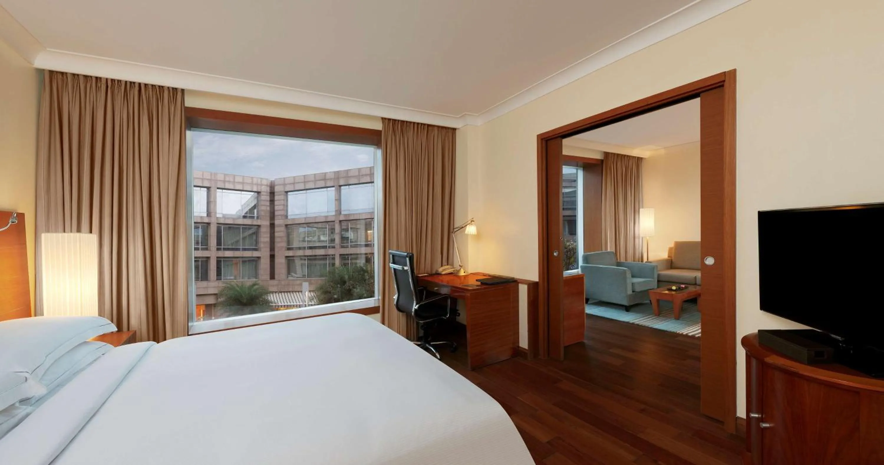 View (from property/room), Bed in Hilton Bangalore Embassy GolfLinks