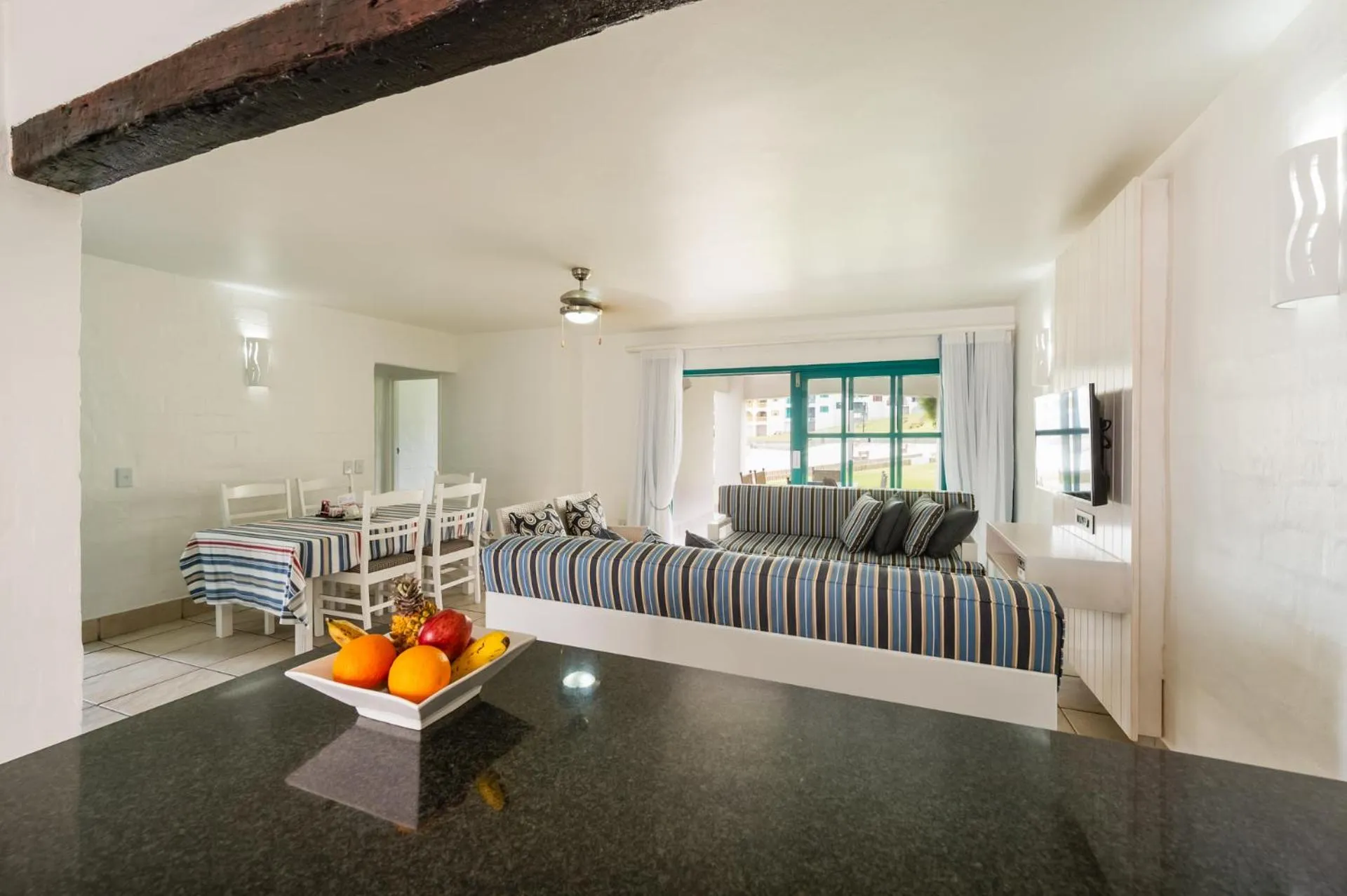 Living room, Bed in Club Mykonos Langebaan