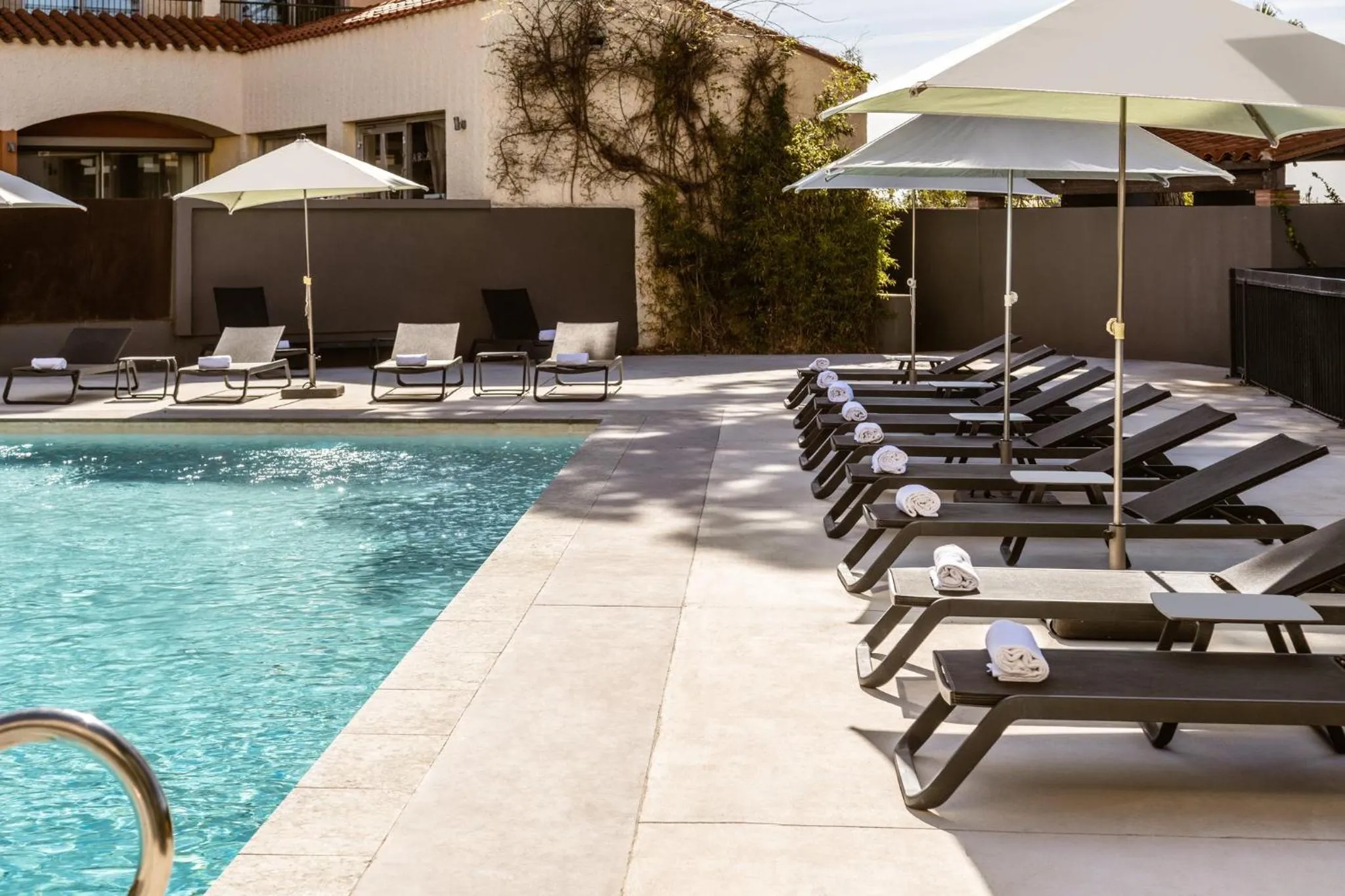 Swimming pool in Holiday Inn Perpignan by IHG