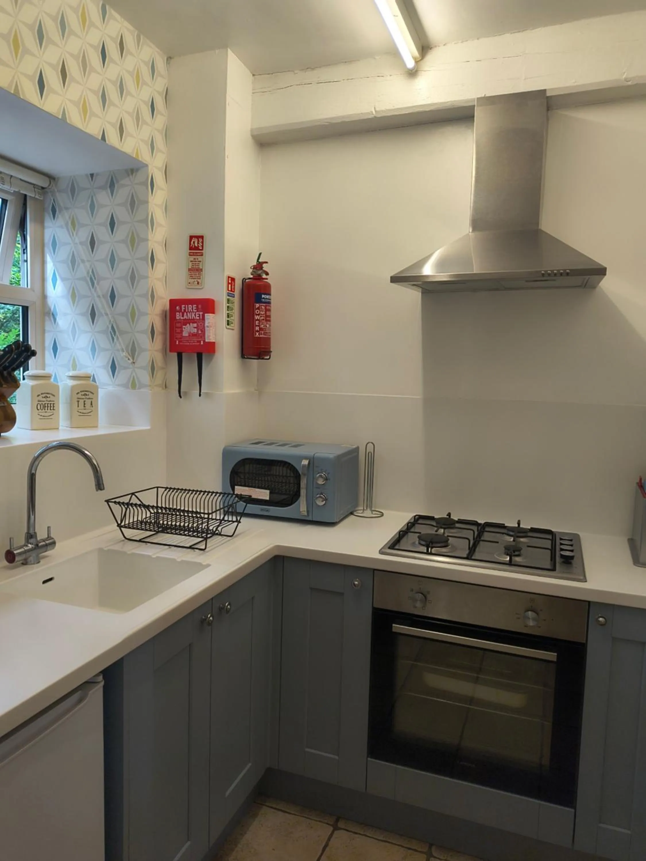 Kitchen or kitchenette in Little John Hotel