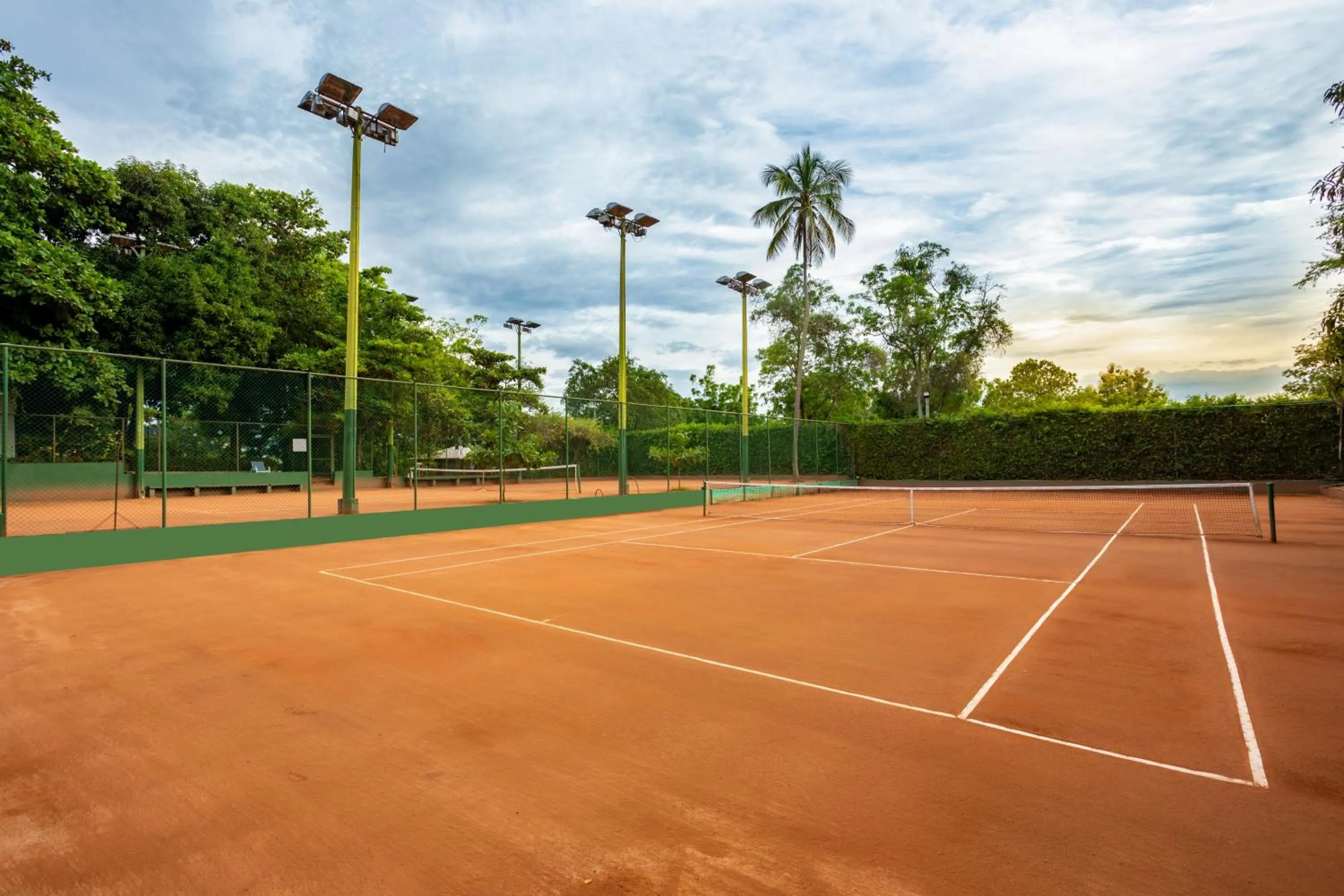 Tennis court in GHL Hotel Club el Puente