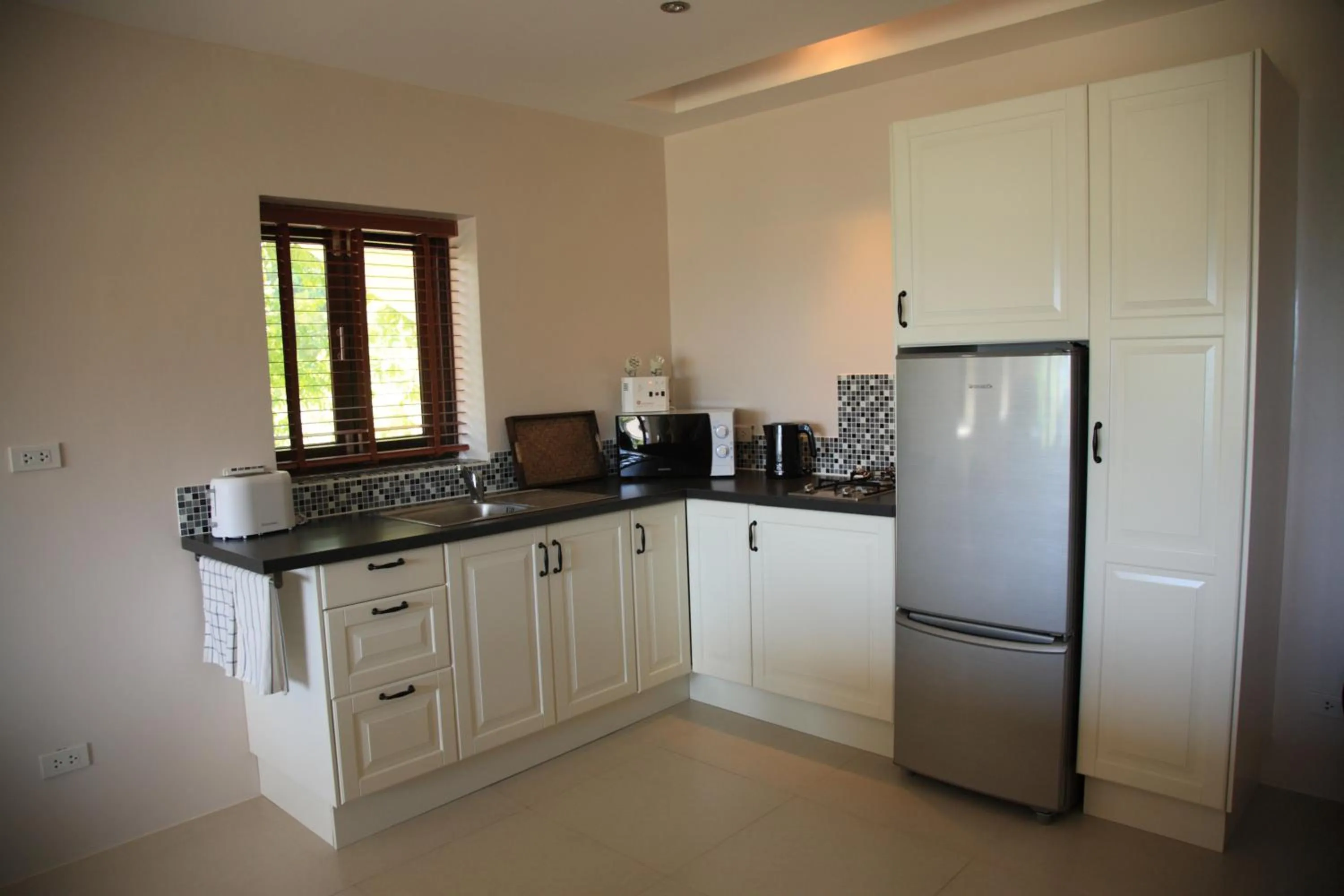 Kitchen or kitchenette in Koh Phangan Pavilions Serviced Apartments