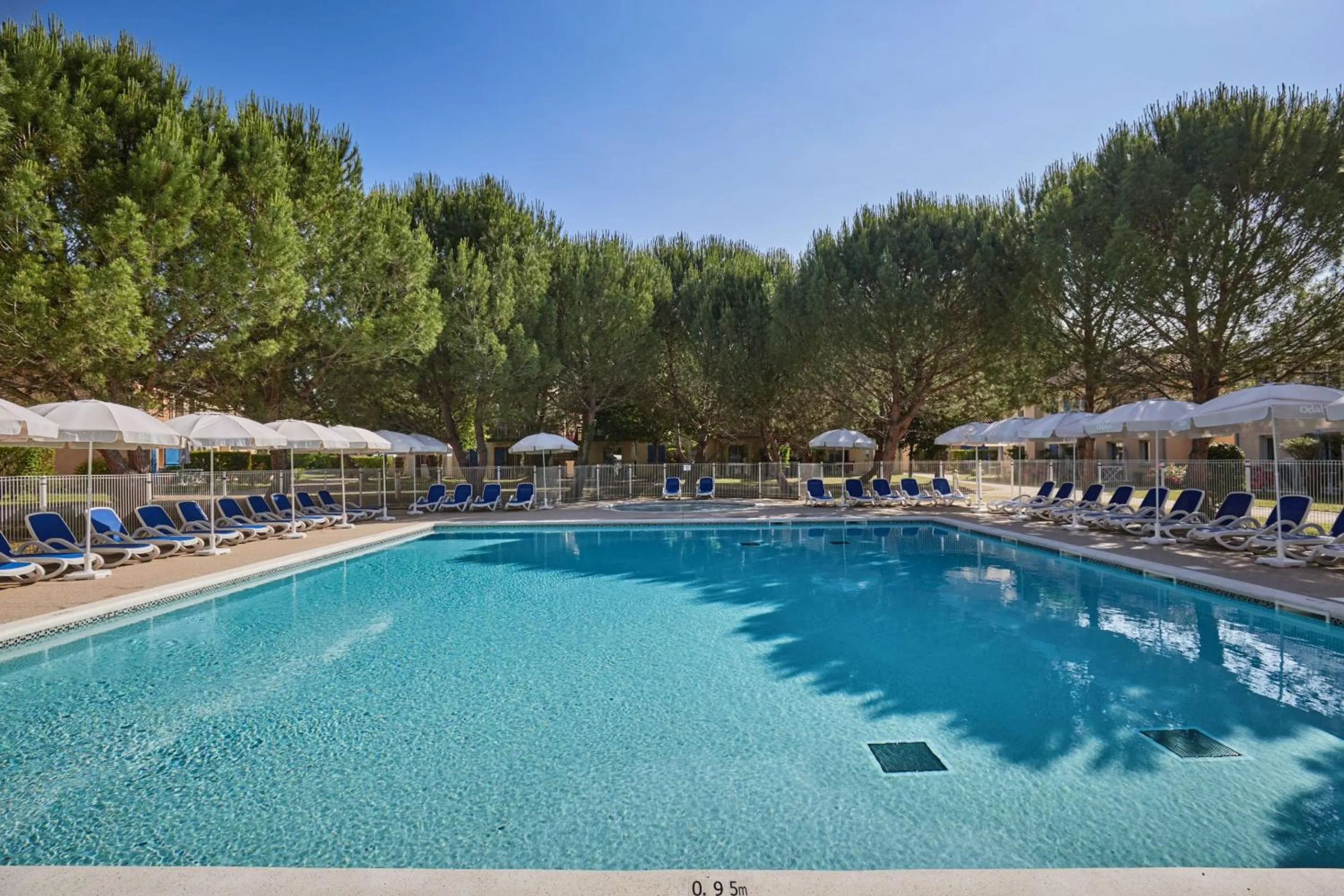 Swimming pool in Résidence Odalys Le Hameau du Moulin