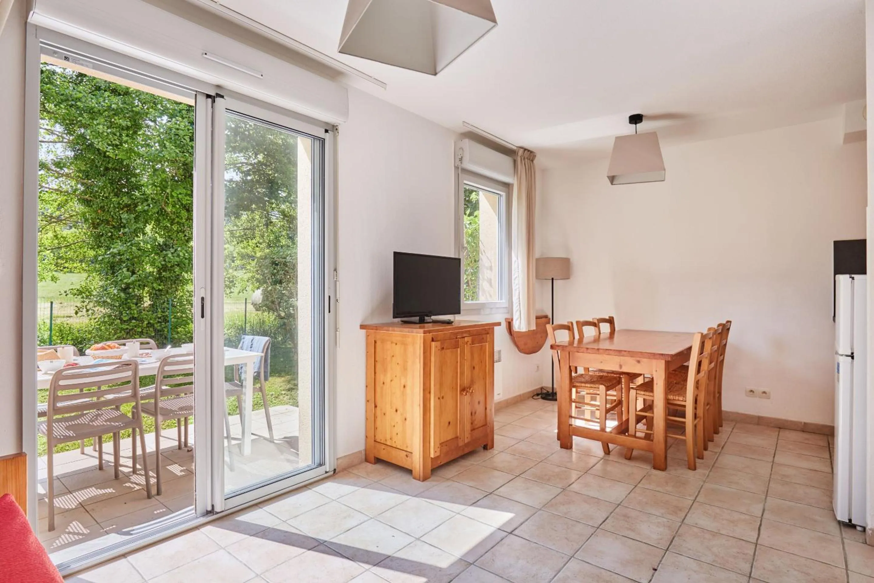 Dining area in Résidence Odalys Le Hameau du Moulin
