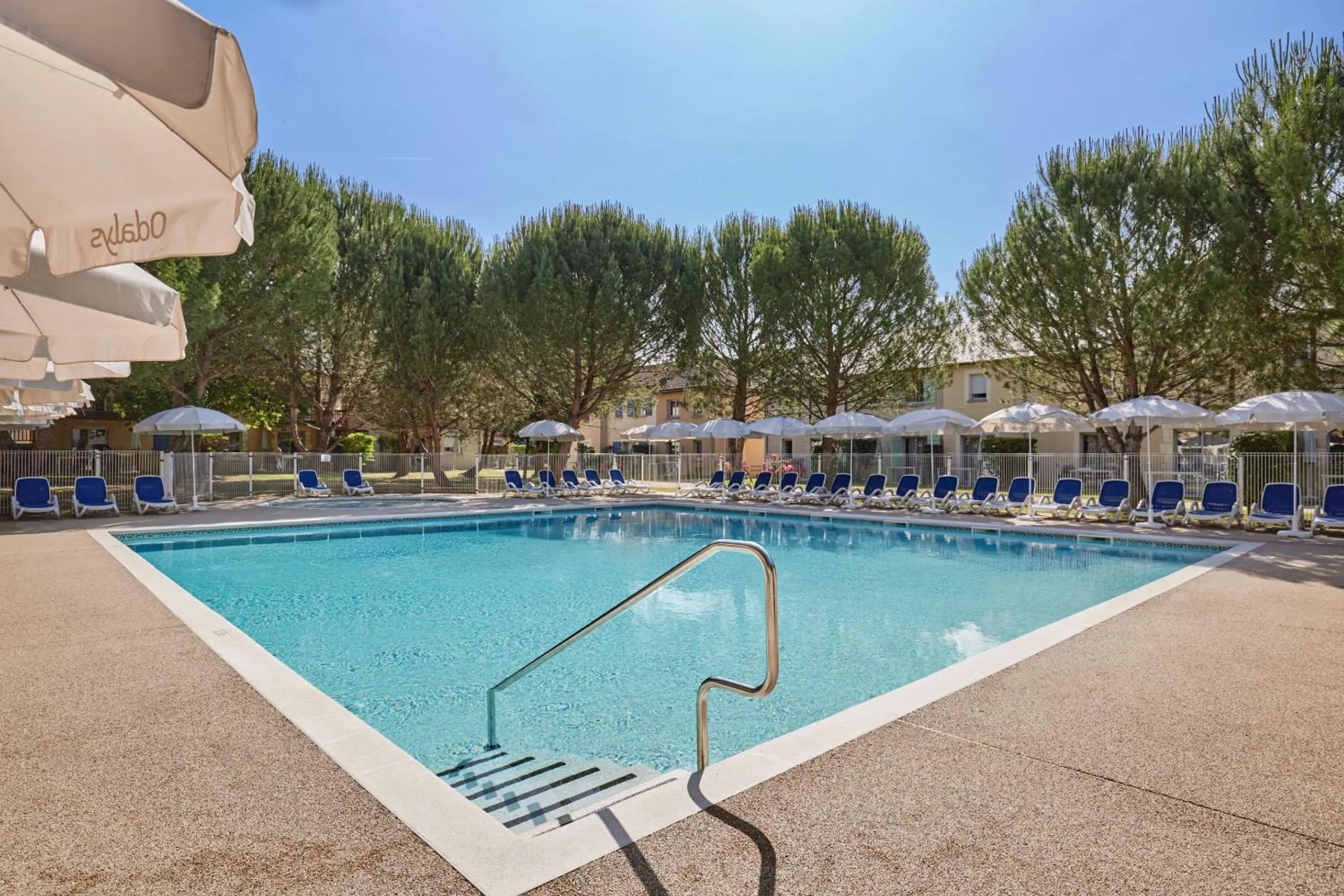 Swimming pool in Résidence Odalys Le Hameau du Moulin