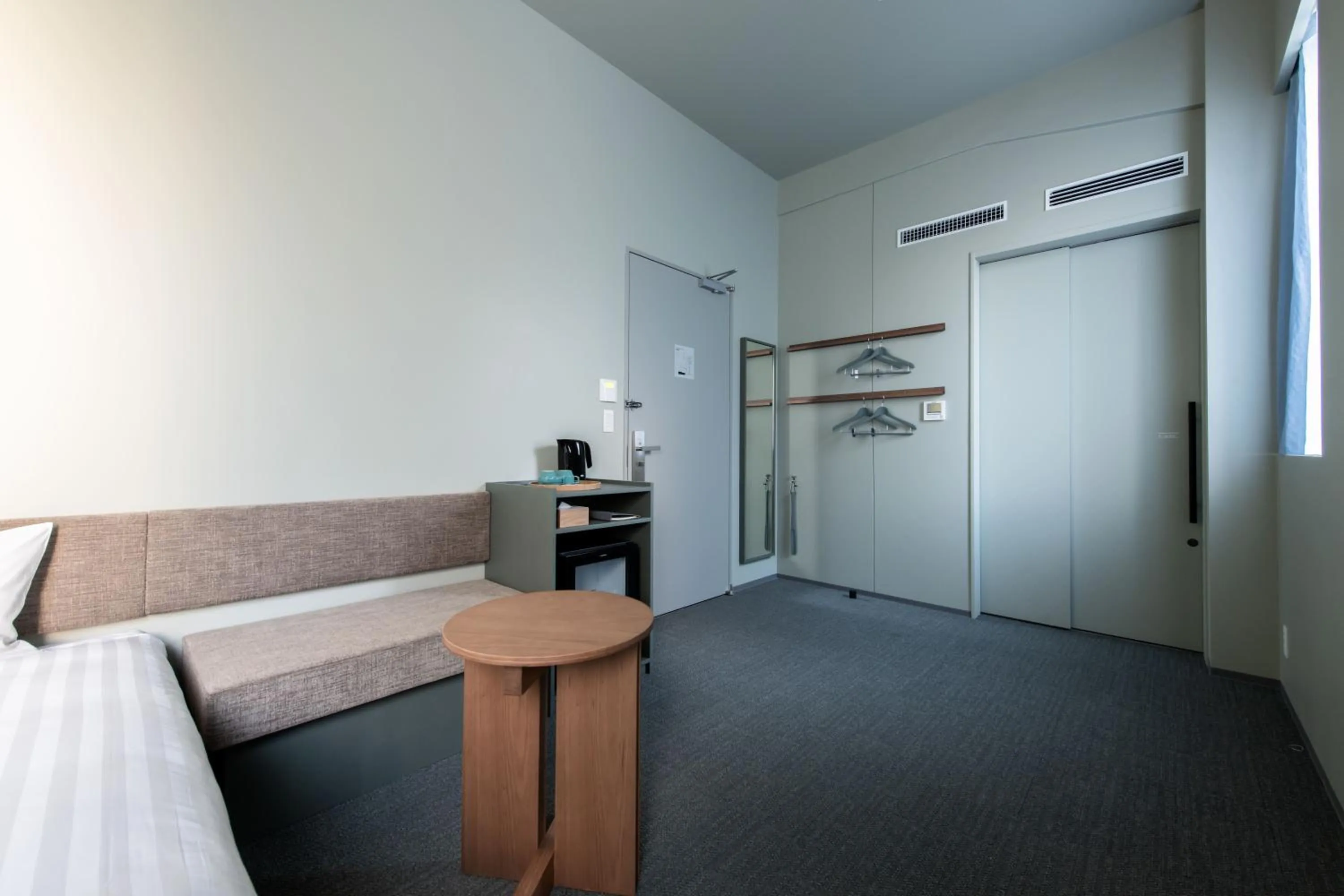 Photo of the whole room, Bed in KAIKA Tokyo by THE SHARE HOTELS