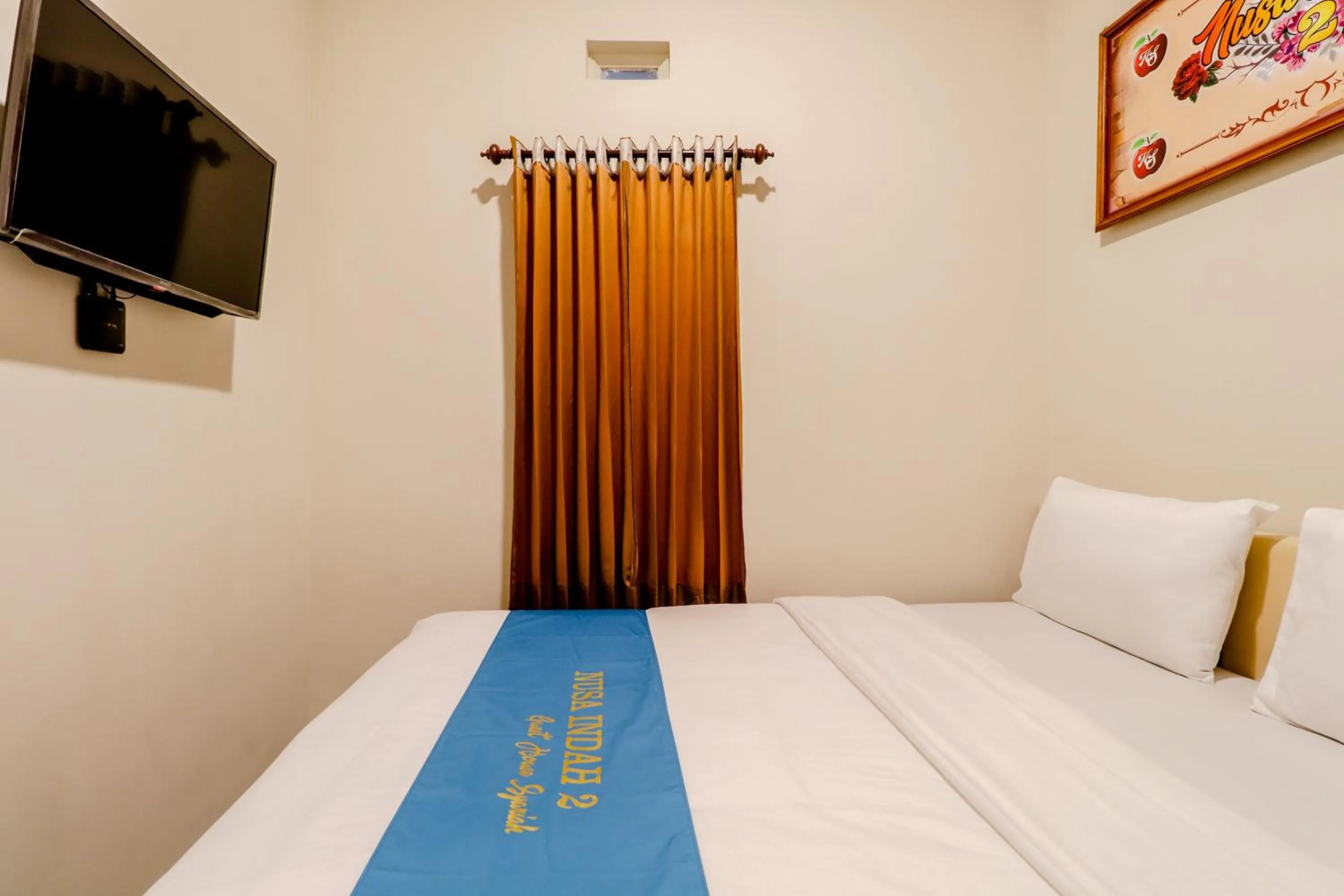 Bed in Guesthouse Nusa Indah Syariah 2