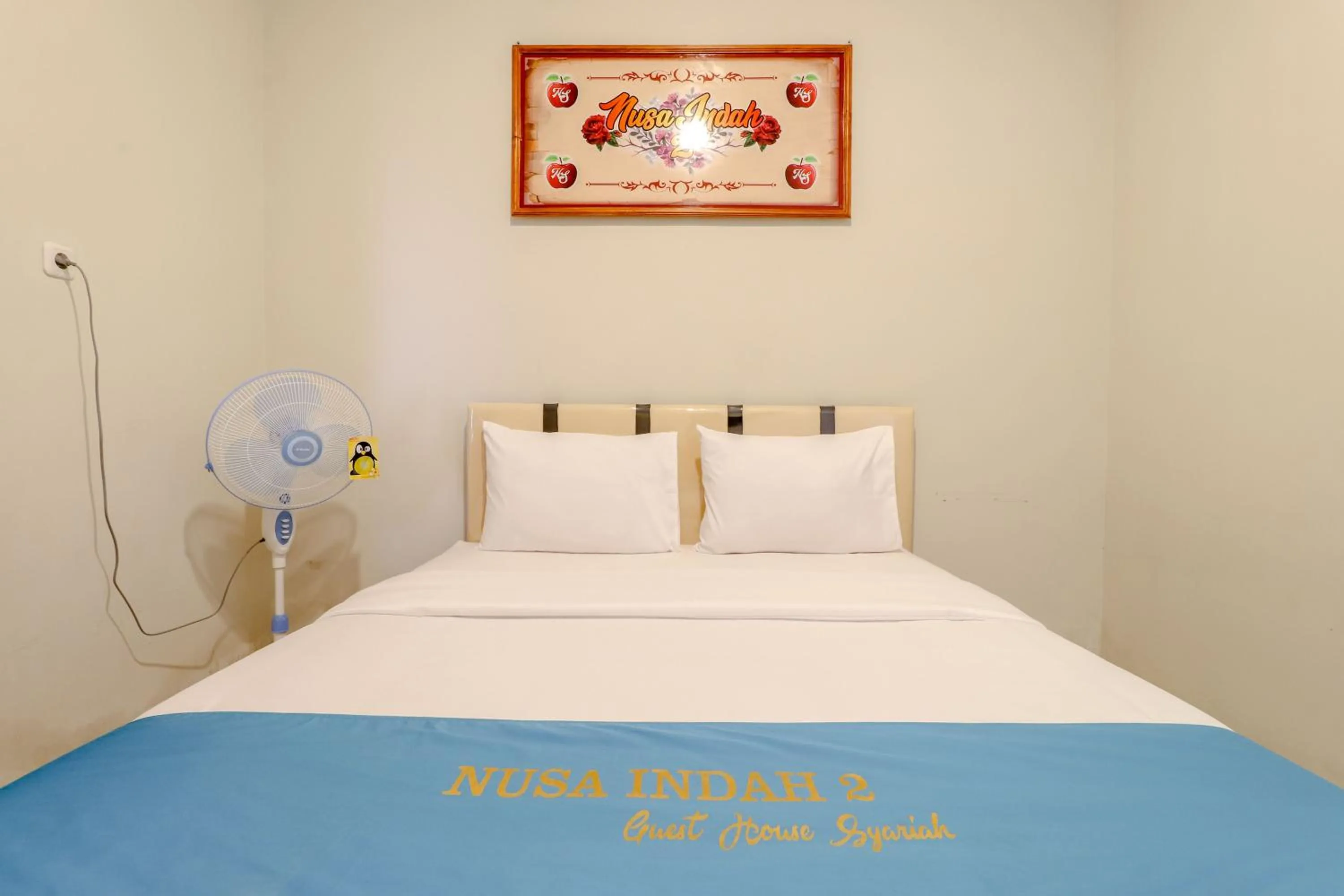 Bed in Guesthouse Nusa Indah Syariah 2