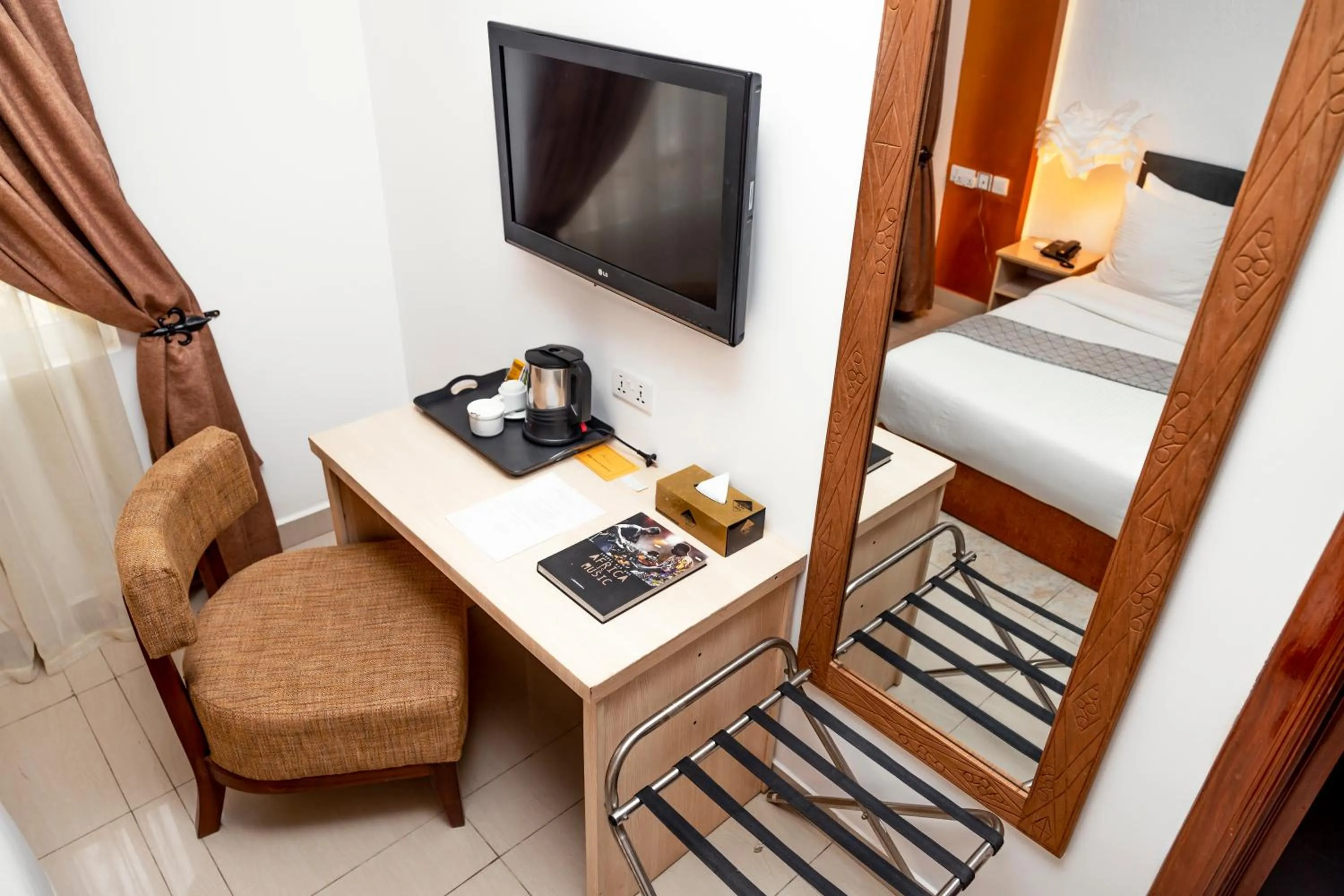 Bed in Amata n'Ubuki Boutique Hotel Ltd