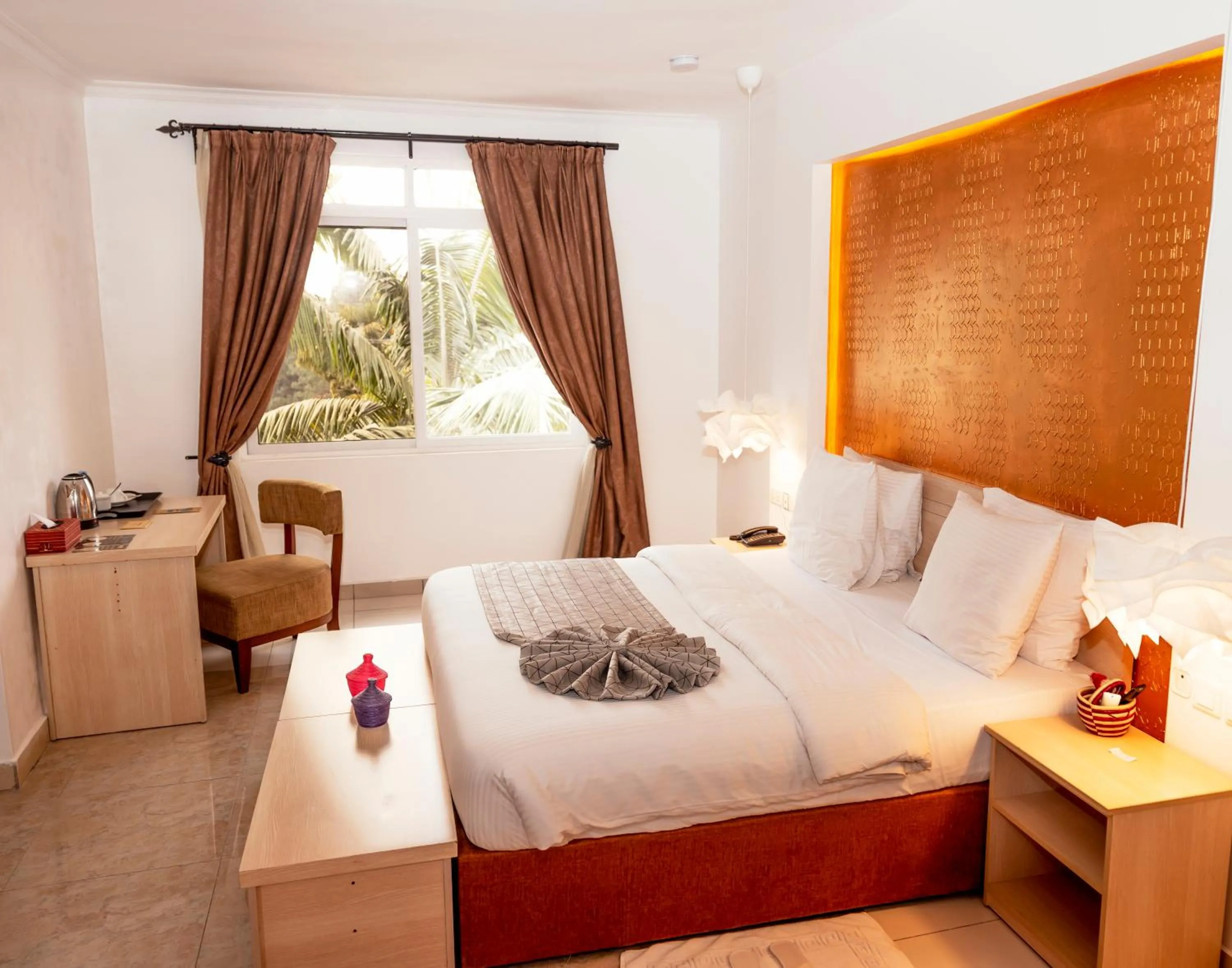 Bed in Amata n'Ubuki Boutique Hotel Ltd