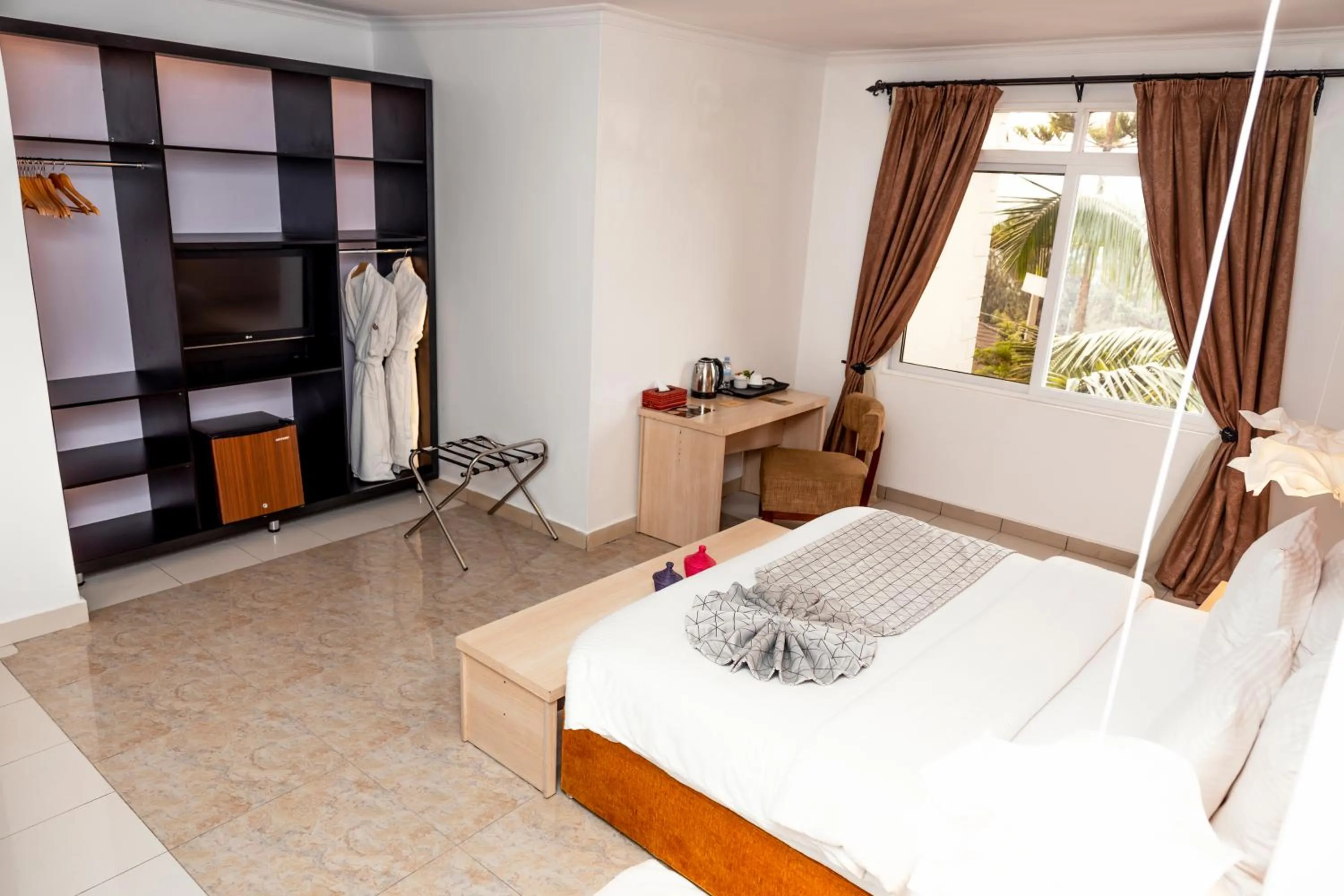 Bed in Amata n'Ubuki Boutique Hotel Ltd