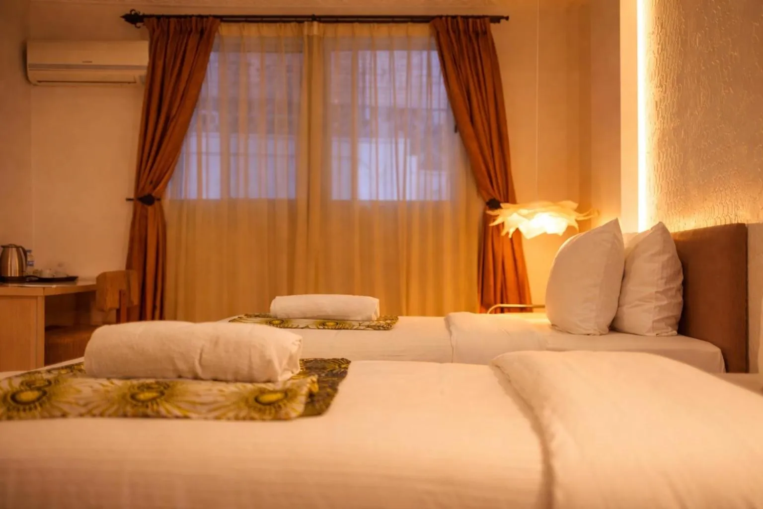 Bed in Amata n'Ubuki Boutique Hotel Ltd