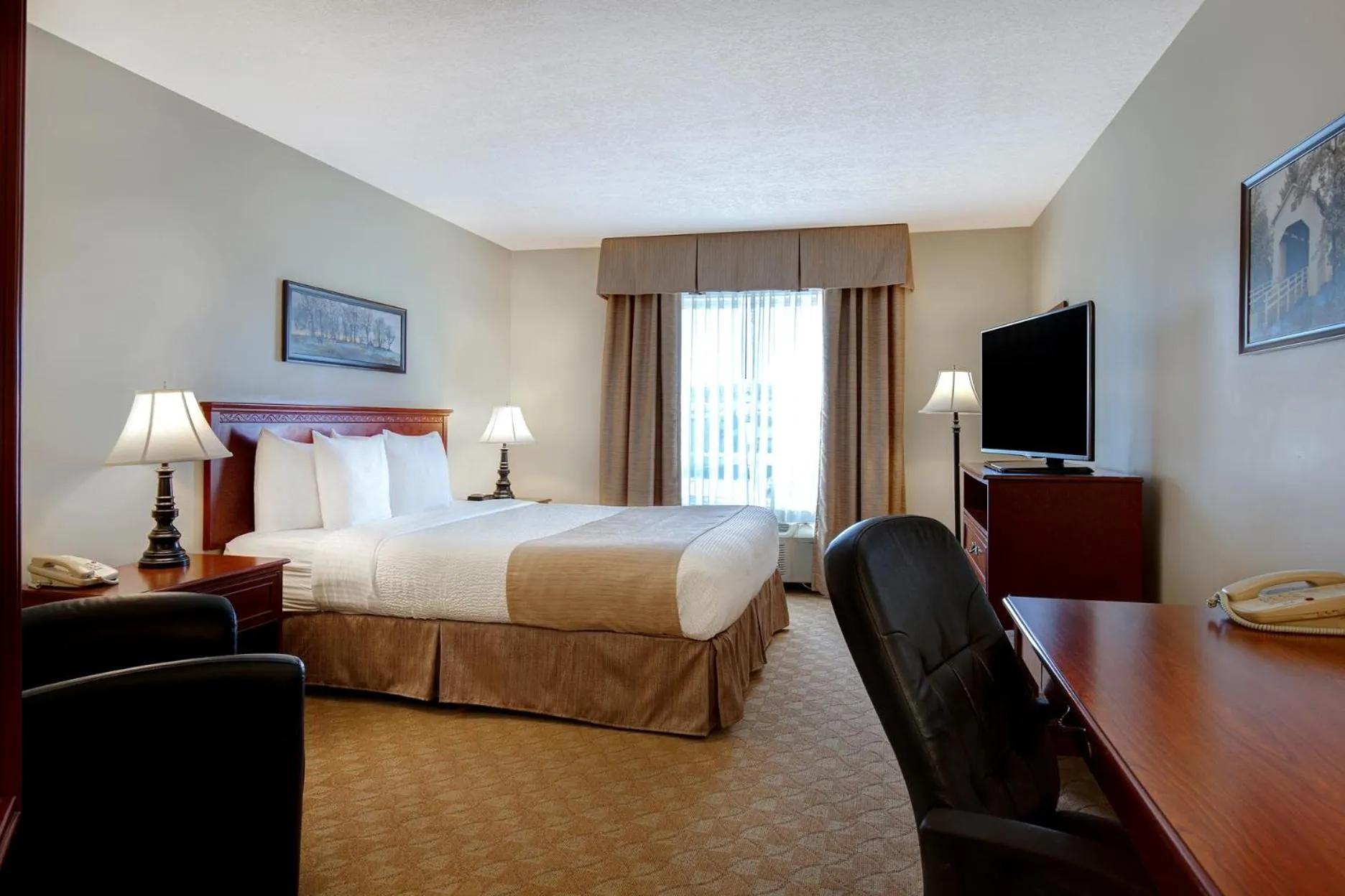 Photo of the whole room, Bed in Days Inn by Wyndham Dawson Creek