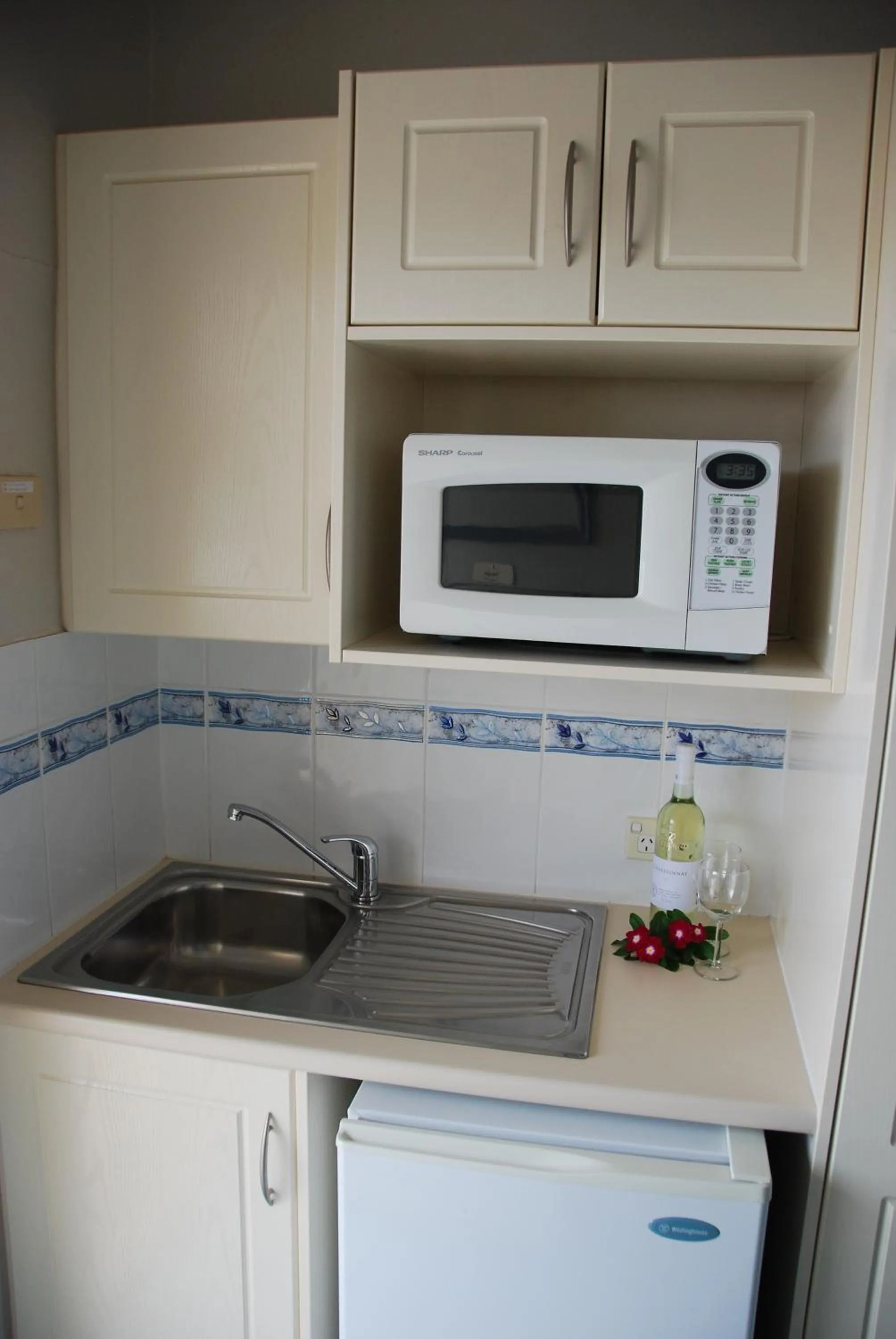 Kitchen or kitchenette in Acacia Motel