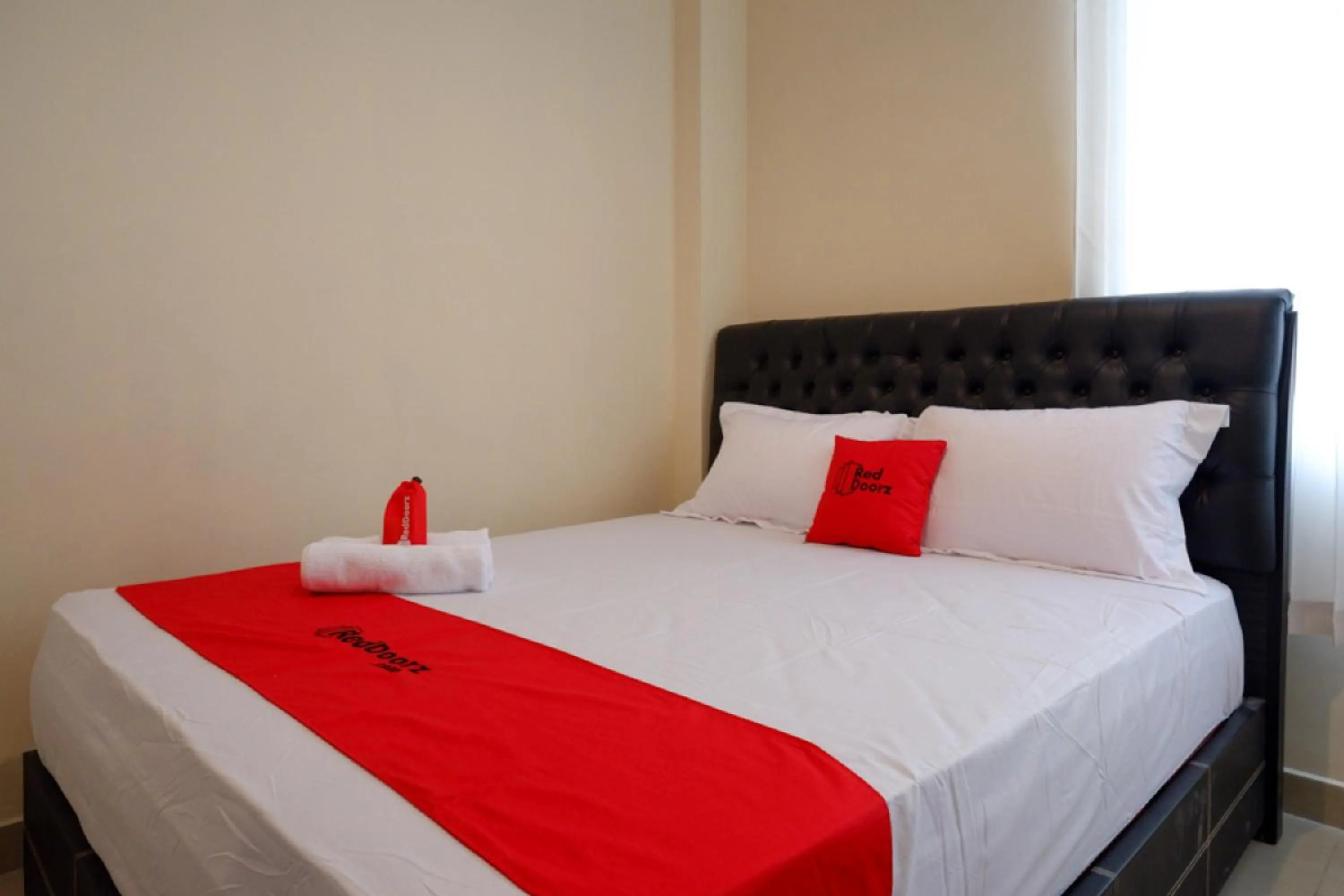 Bed in RedDoorz near Millenium Waterpark Palu
