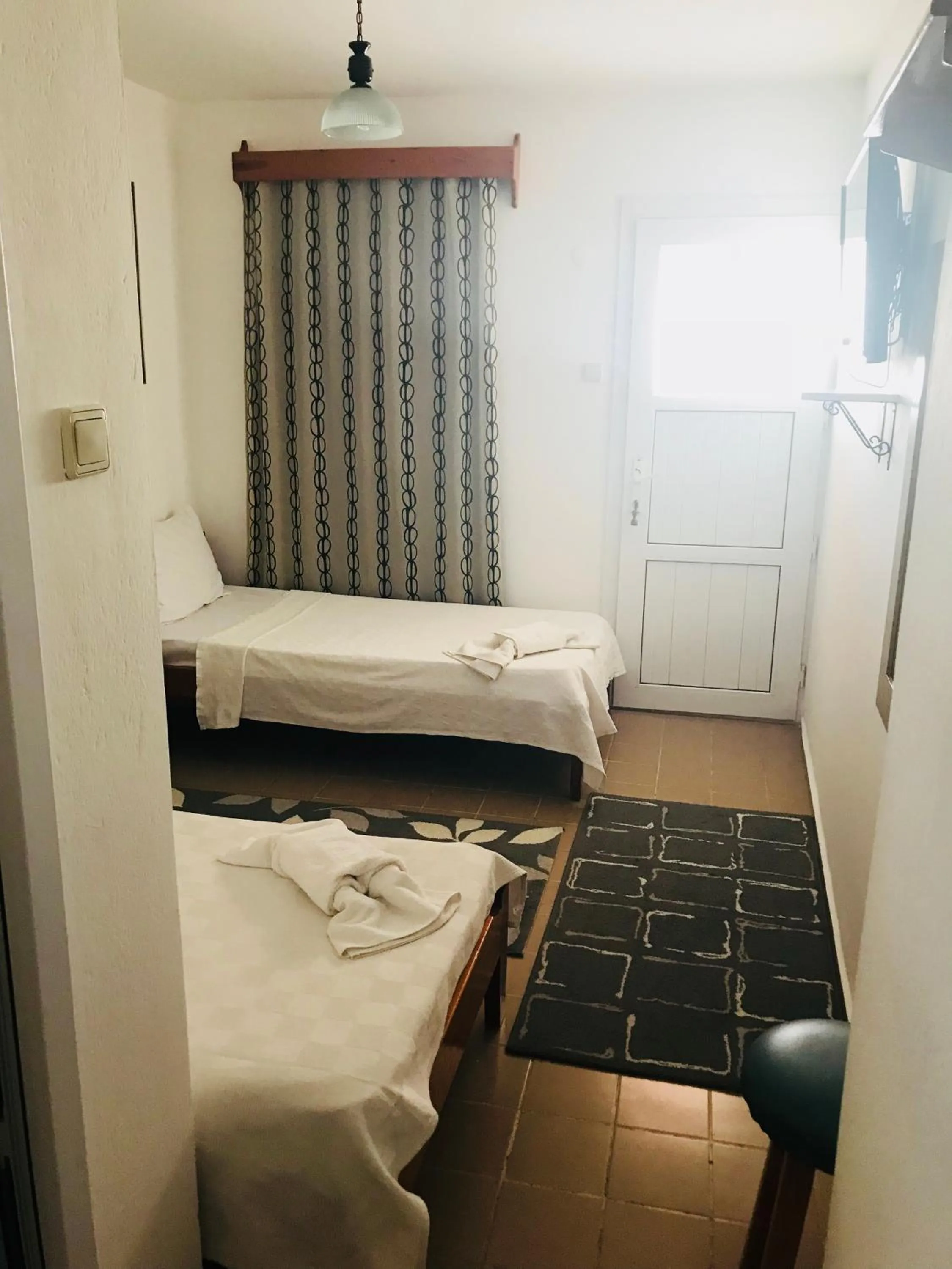 TV and multimedia, Bed in Cam Hotel