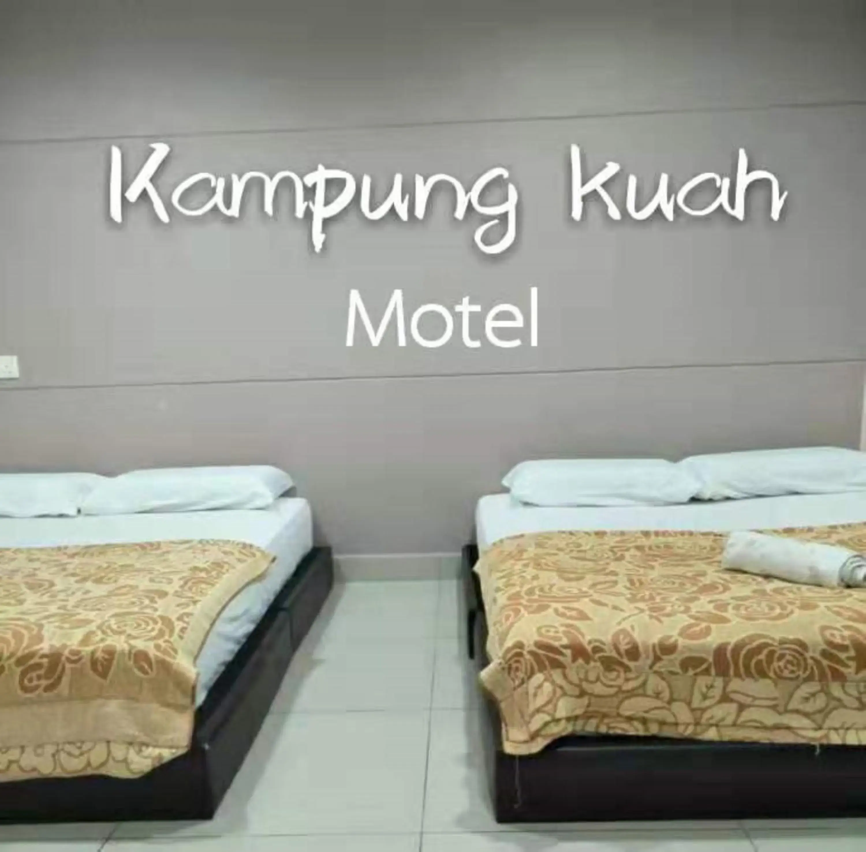 Deluxe Quadruple Room in Motel Kampung Kuah Deluxe Quadruple Room in Motel Kampung Kuah