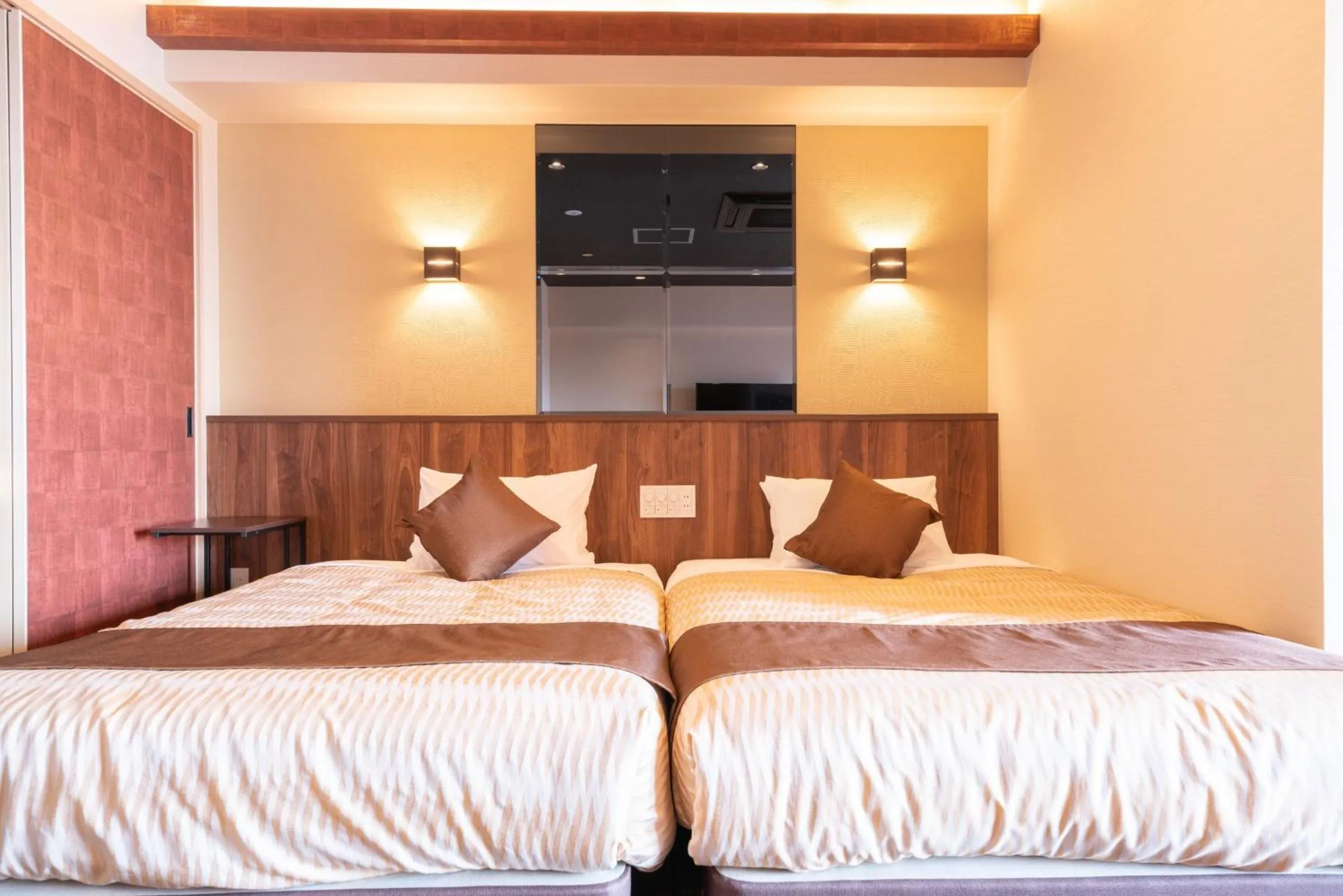 Bed in LiVEMAX RESORT Miyahama Ocean View