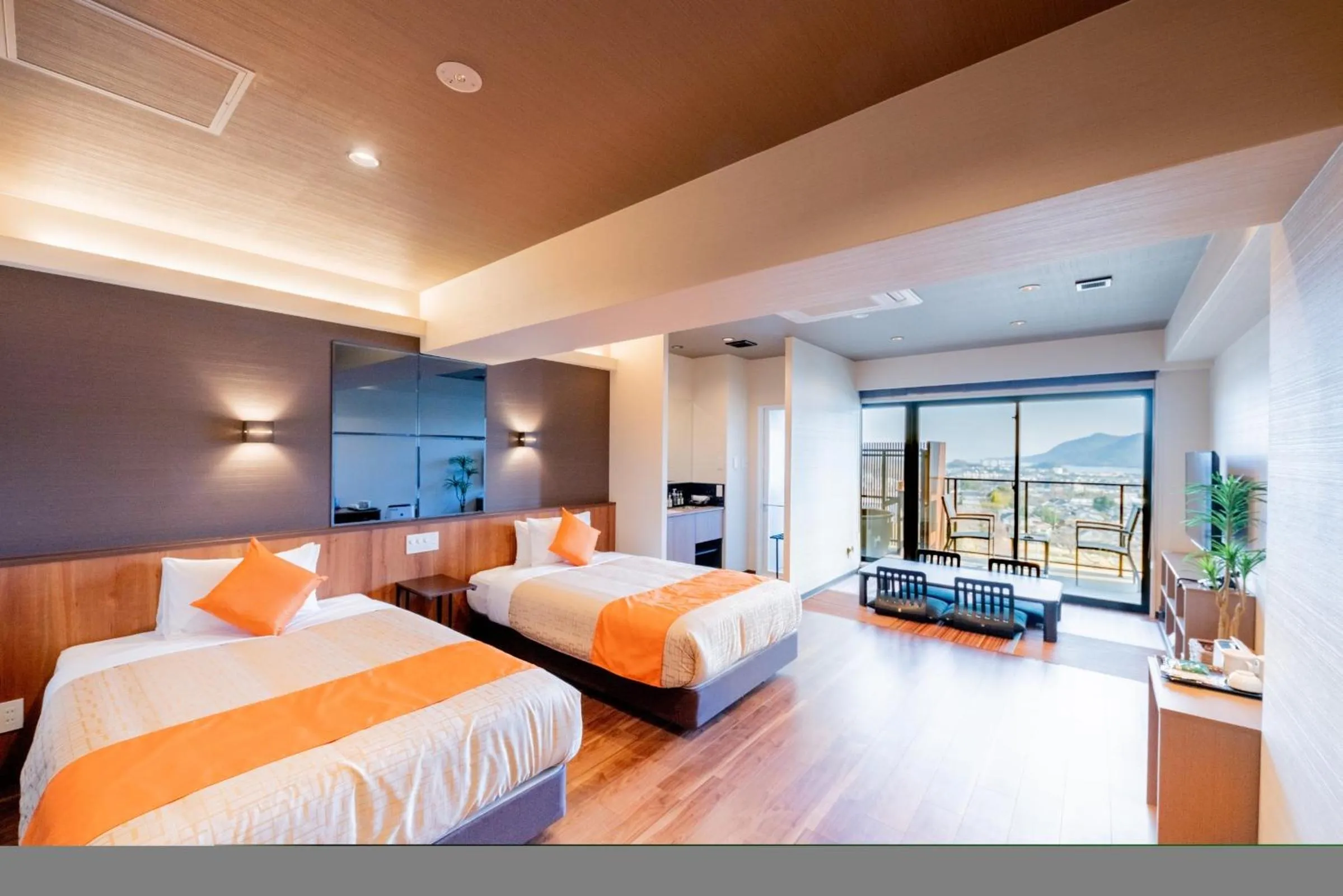 Bed in LiVEMAX RESORT Miyahama Ocean View