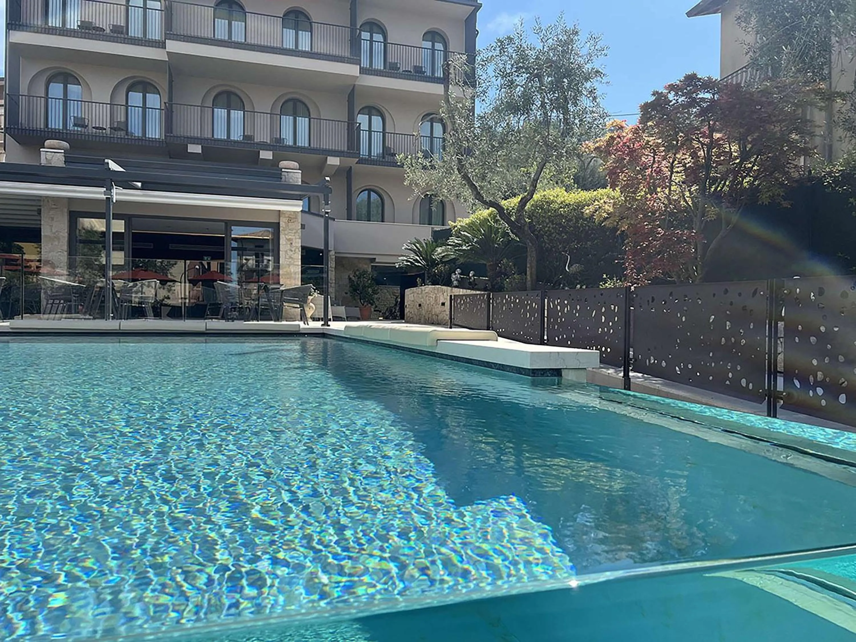 Pool view in Hotel Ristorante Al Caminetto WorldHotels Crafted Adults Only