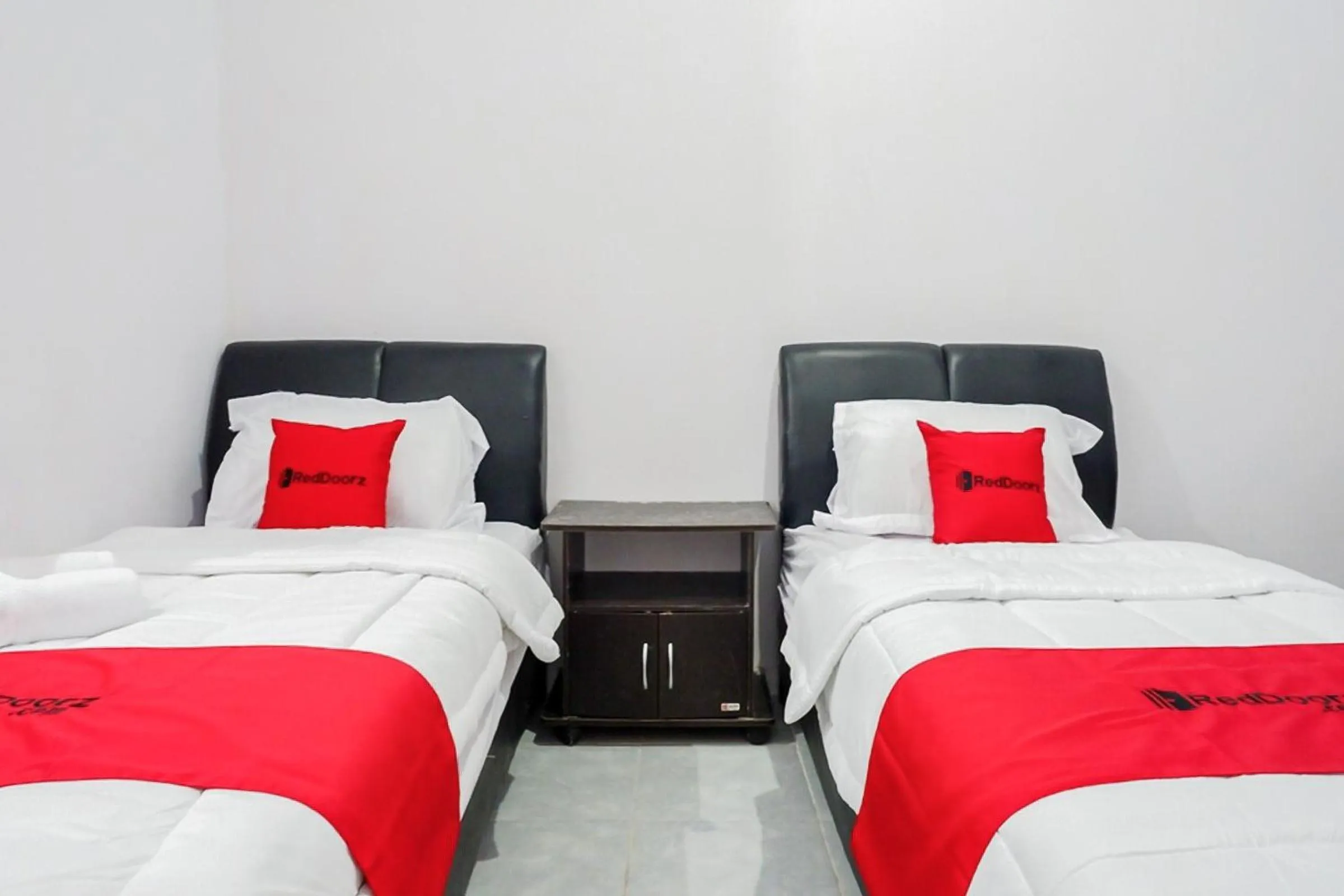 Bedroom, Bed in RedDoorz Plus at Hotel Lestari Karema Mamuju