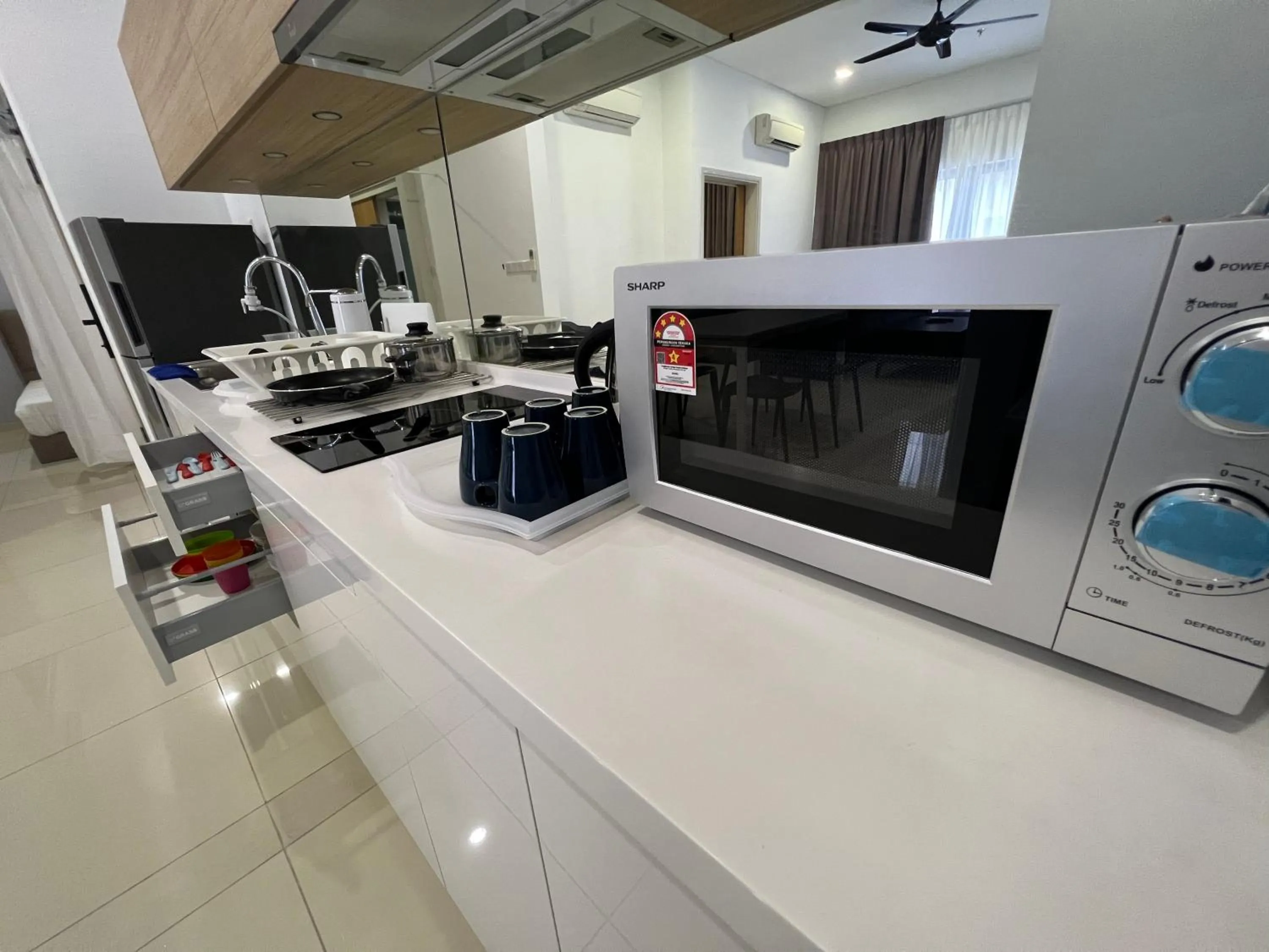 Kitchen or kitchenette in Plaza Arkadia Desa Parkcity by KLhomesweet