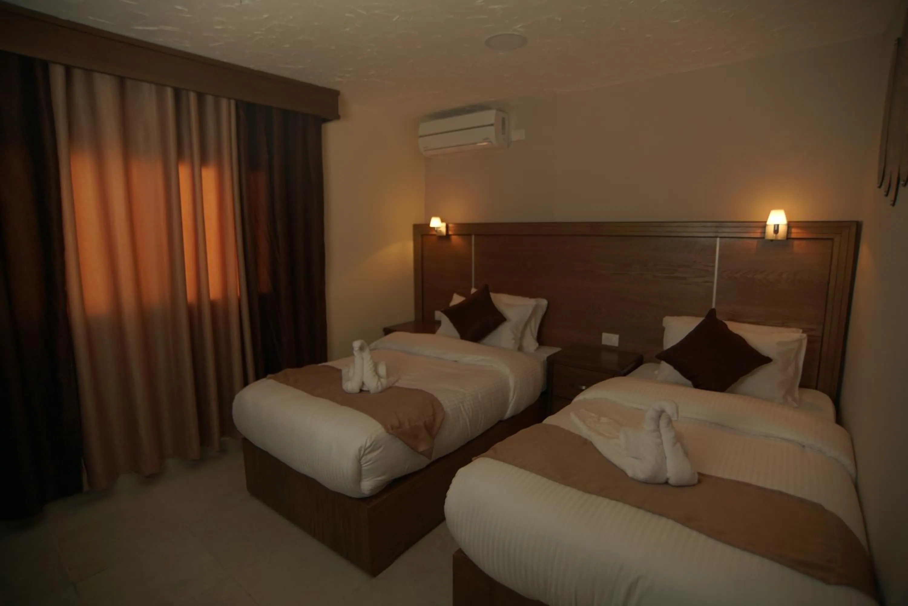 Photo of the whole room, Bed in Petra Aretas Hotel