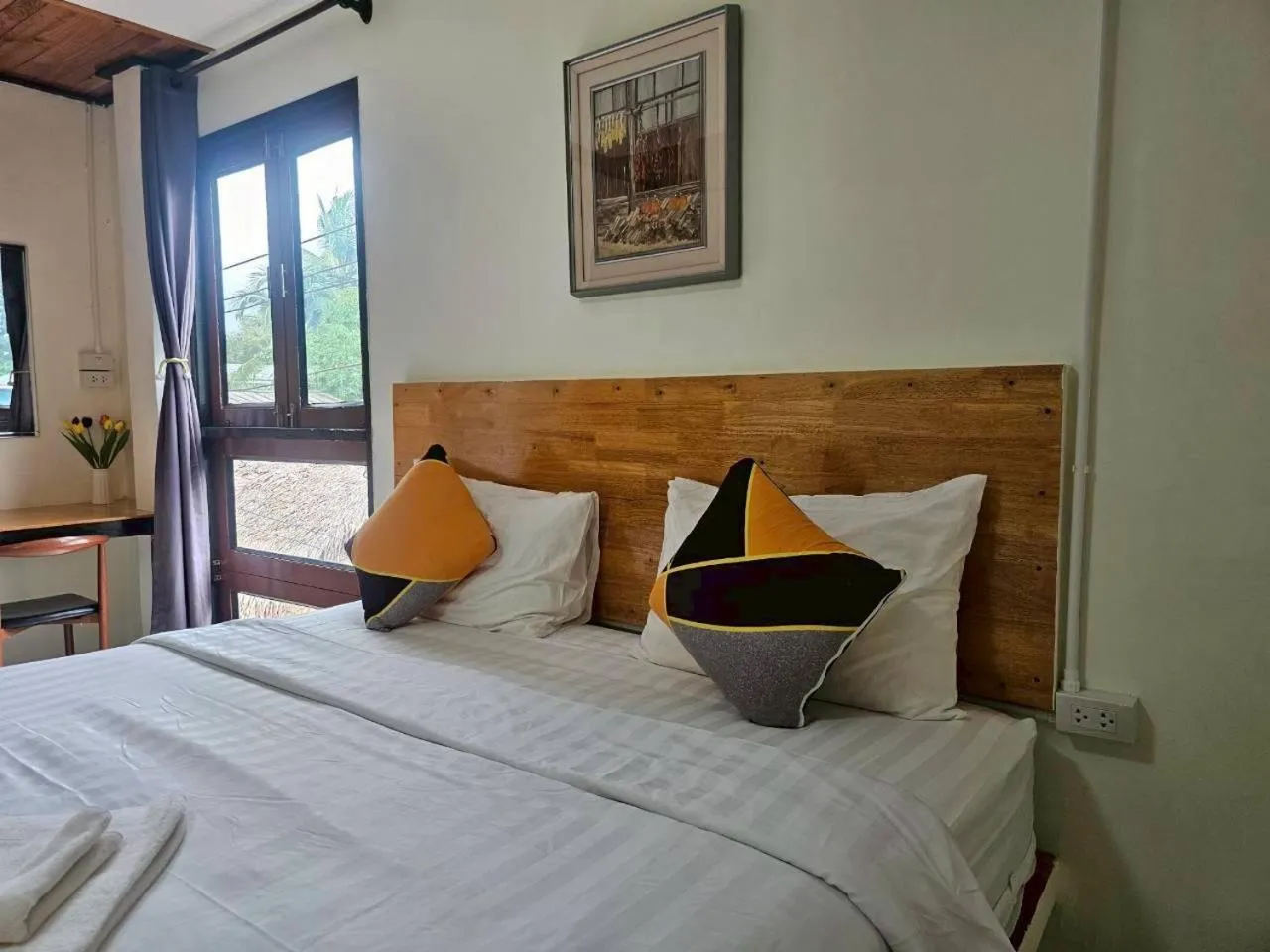 Bed in Mookboonchu Guesthouse ,Kohmook Trang