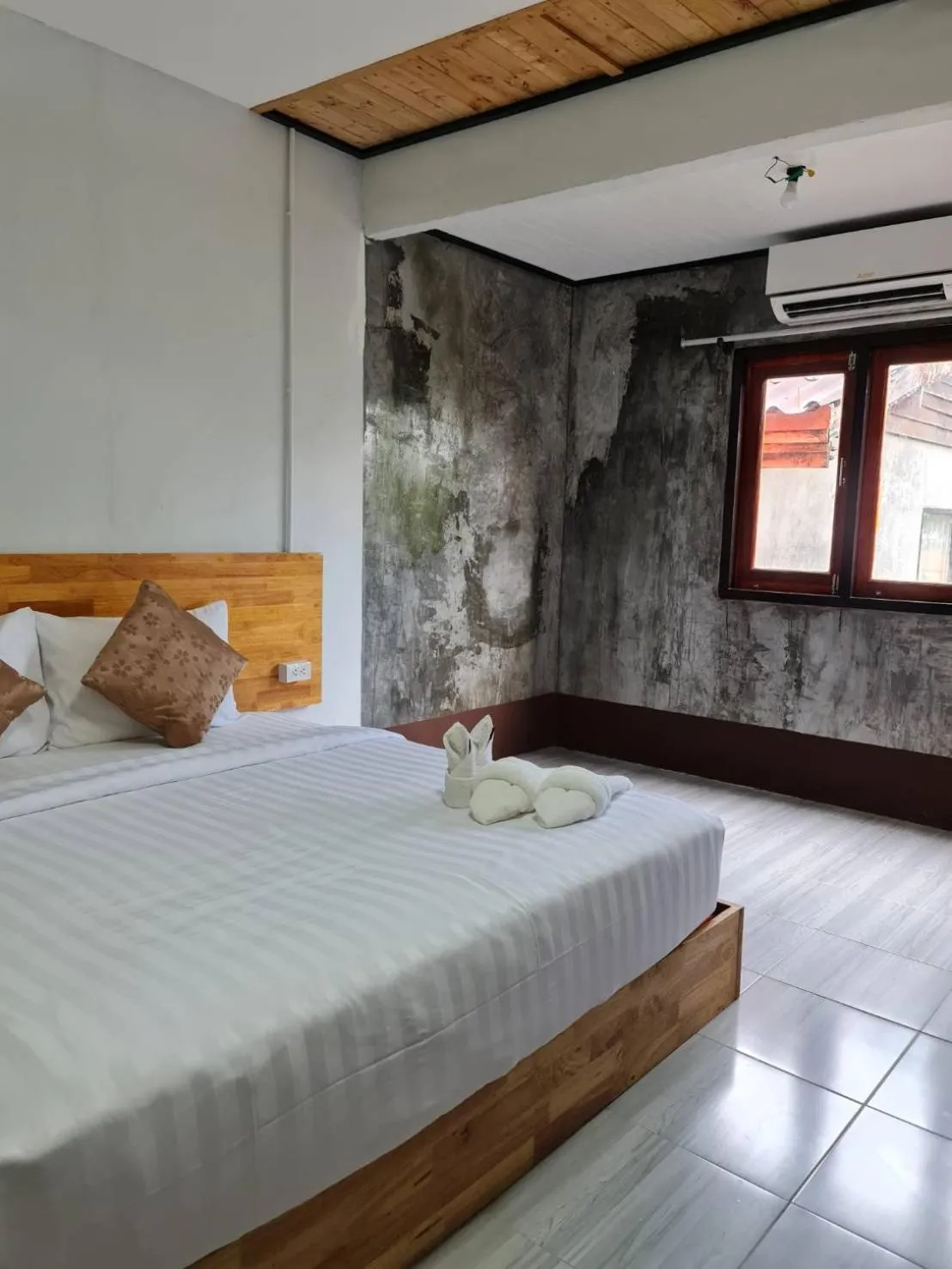 Bed in Mookboonchu Guesthouse ,Kohmook Trang