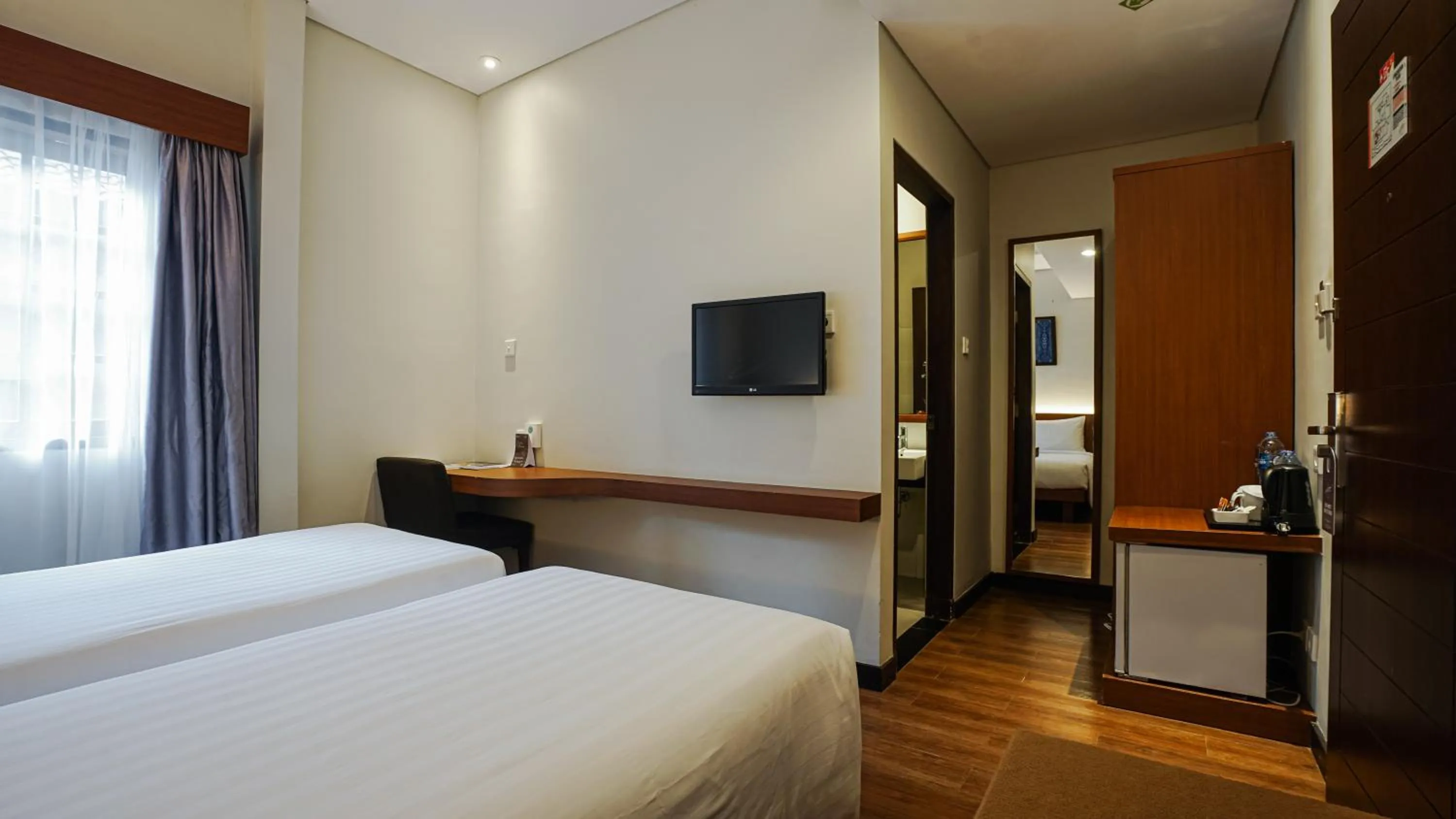 Bed in Grand Whiz Hotel Nusa Dua Bali