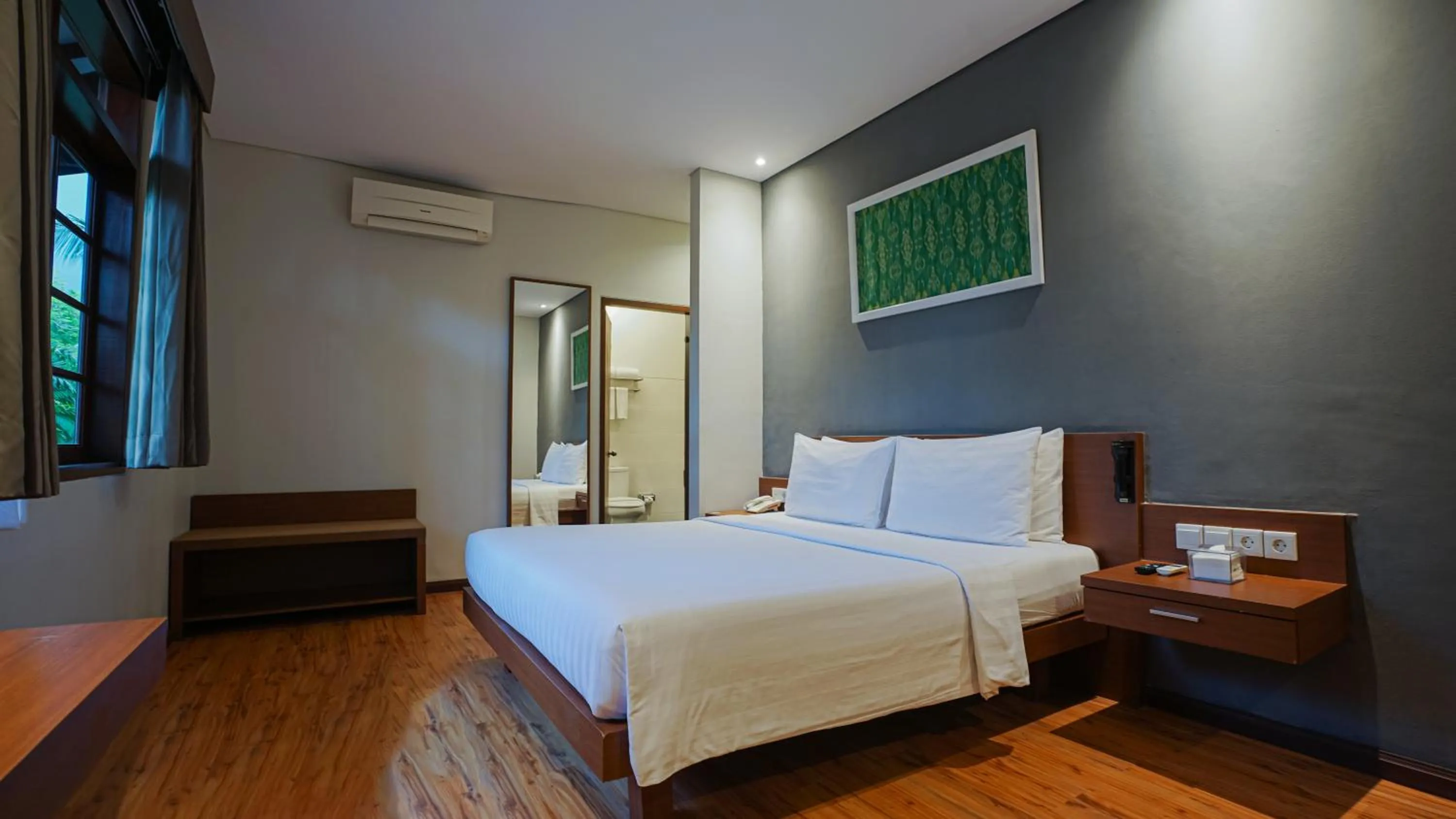 Bed in Grand Whiz Hotel Nusa Dua Bali