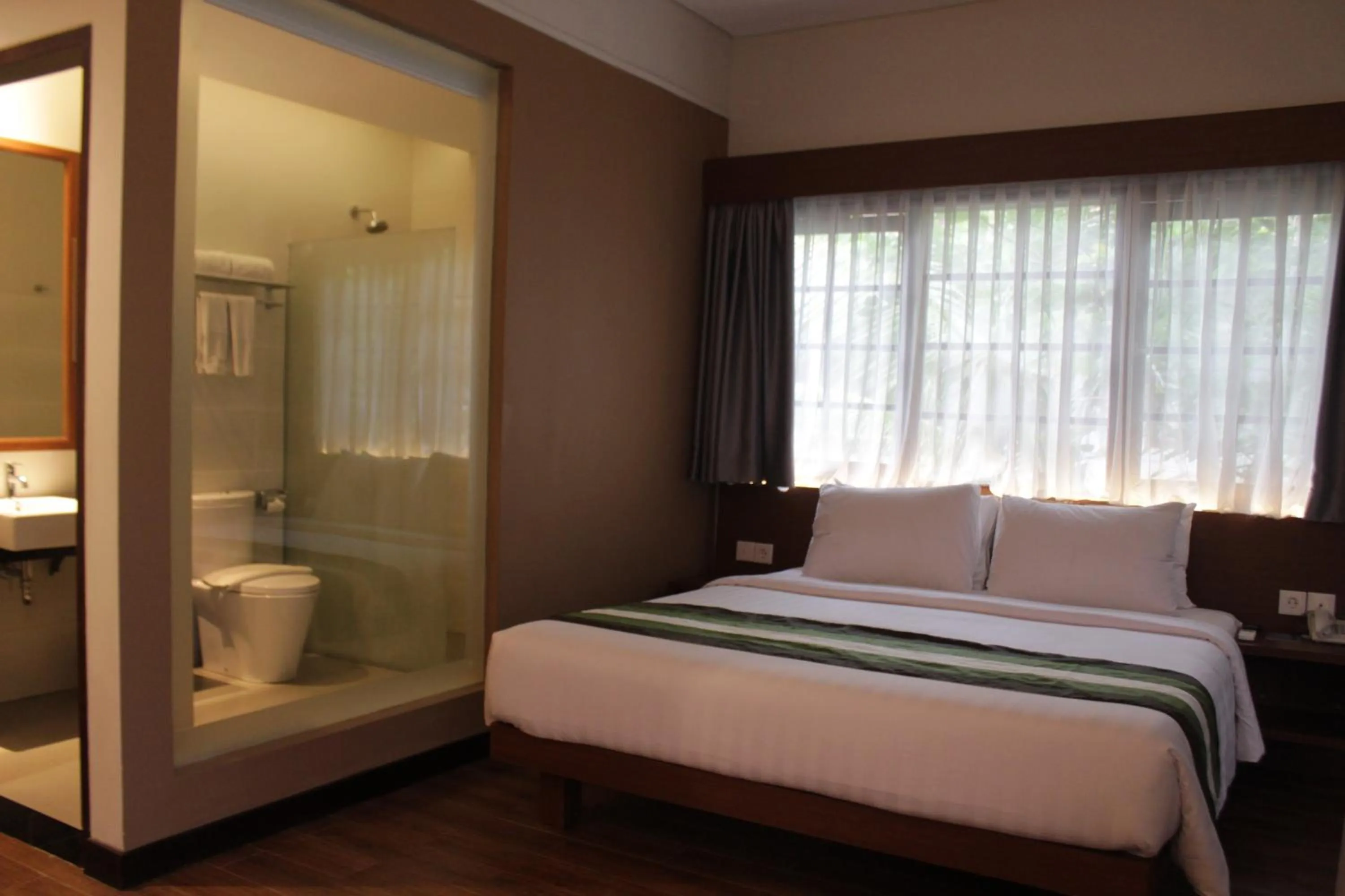 Bed in Grand Whiz Hotel Nusa Dua Bali