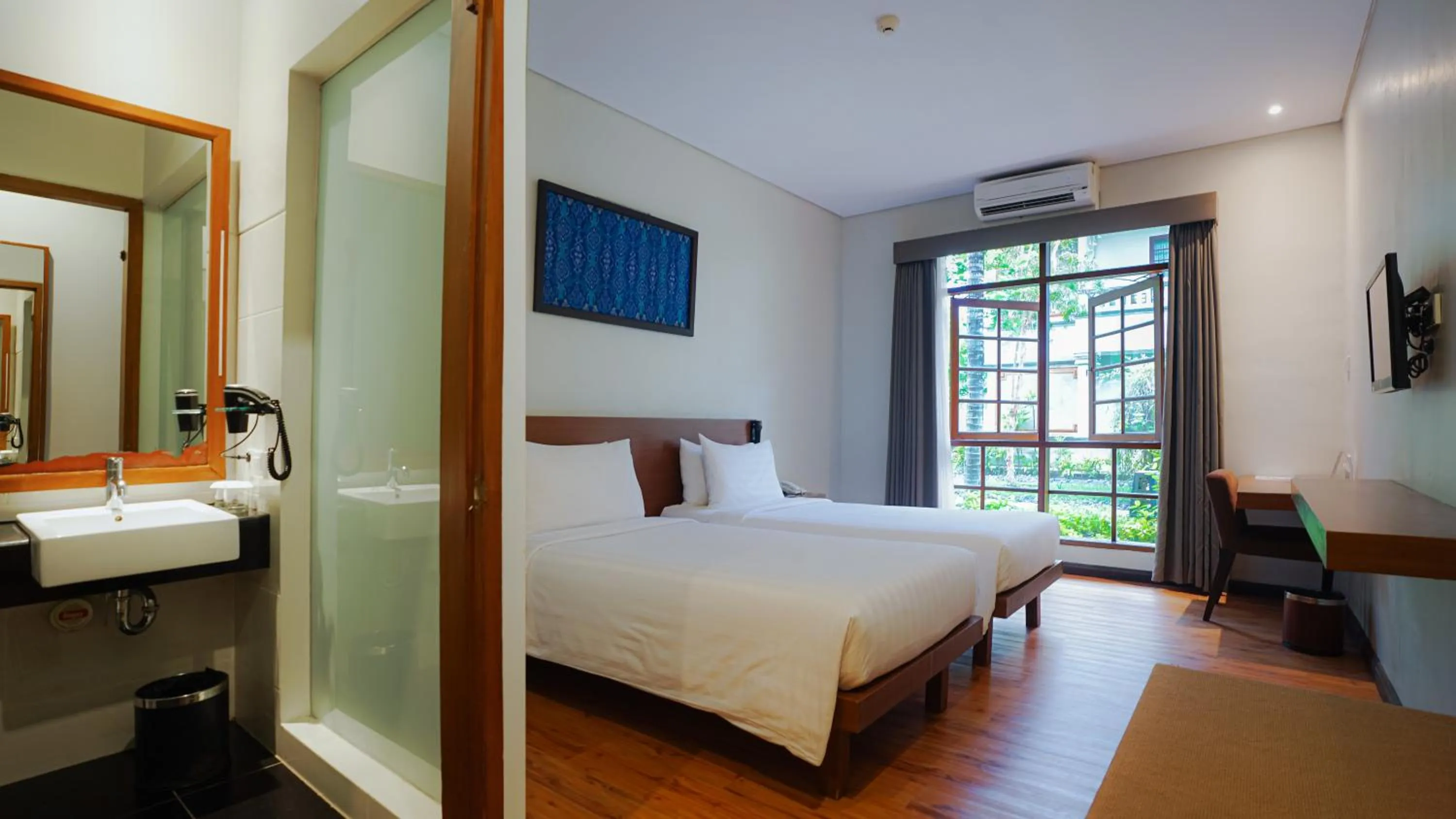 Bed in Grand Whiz Hotel Nusa Dua Bali