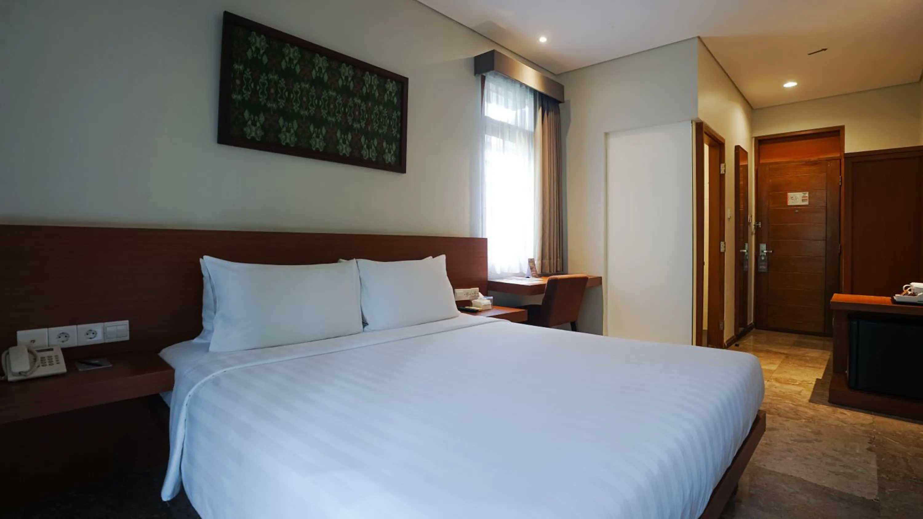 Bed in Grand Whiz Hotel Nusa Dua Bali