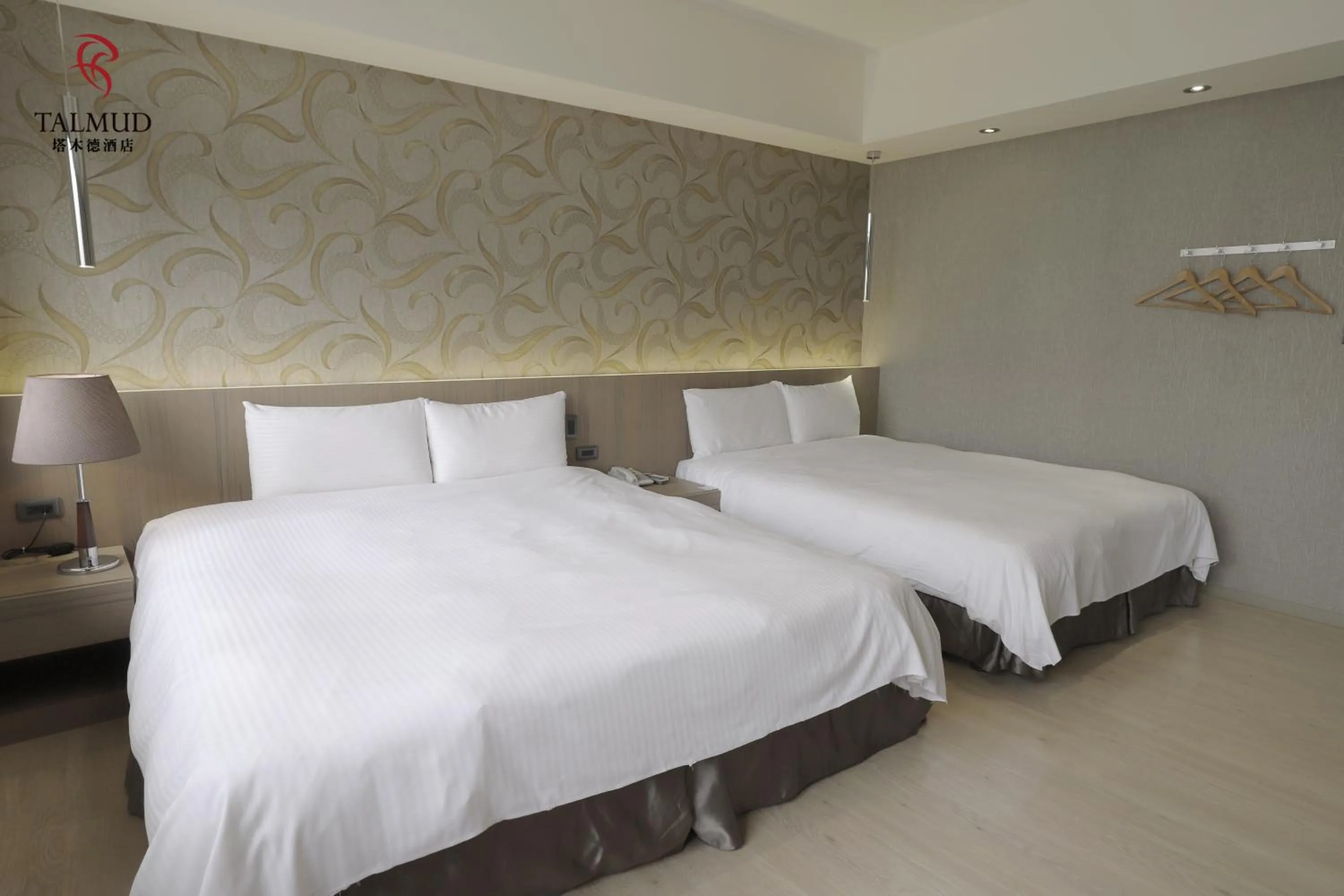 Photo of the whole room, Bed in Talmud Hotel Taichung